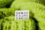 Finger weg! Warum Sie Wollpullover niemals mit Vollwaschmittel waschen sollten