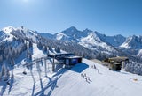 Hauser-Kaibling. dAn der Senderbah eröffnen sich weite Pisten und alpine Weitblicke.