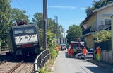 Güterzug gegen Bagger