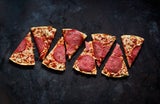 Mamma mia! Den beliebtesten Pizza-Belag der Österreicher erraten Sie nie