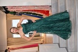 Ekaterina Mucha in einem grünen Abendkleid von Erika Suess