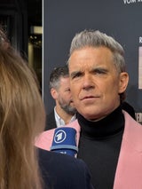 Robbie: „In meinem Film bin ich die meiste Zeit ein Arschloch!“