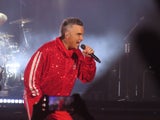 "Kopfüber"-Robbie Williams lässt Klagenfurt ausflippen