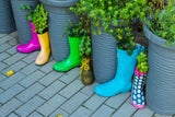 Ausrangierte Gummistiefel wuchern hier als originelle Deko.&nbsp;