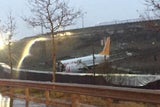Flugzeug zerbricht bei Landung: 3 Tote, 179 Verletzte