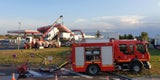 Autotransporter reißt Tankstelle nieder