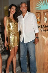 Amal Clooney - Strahlende Goldmarie