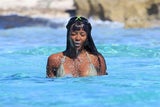 Naomi Campbell: Gut gelaunte Wasserratte