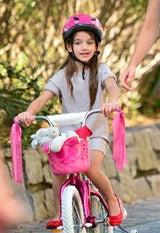 Katie Holmes bring Suri Cruise das Rad fahren bei