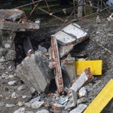 Unwetter-Flut spült Friedhof frei