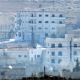 IS hisst Flagge in Kobane