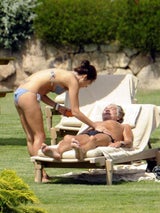 Roberto Cavalli und Freundin in Porto Cervo