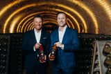 Peter Tremel, Markengründer von treml Punsch mit Schlumberger CEO Florian Czink