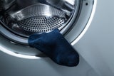 Mysterium ist gelöst: Warum Waschmaschinen wirklich unsere Socken fressen