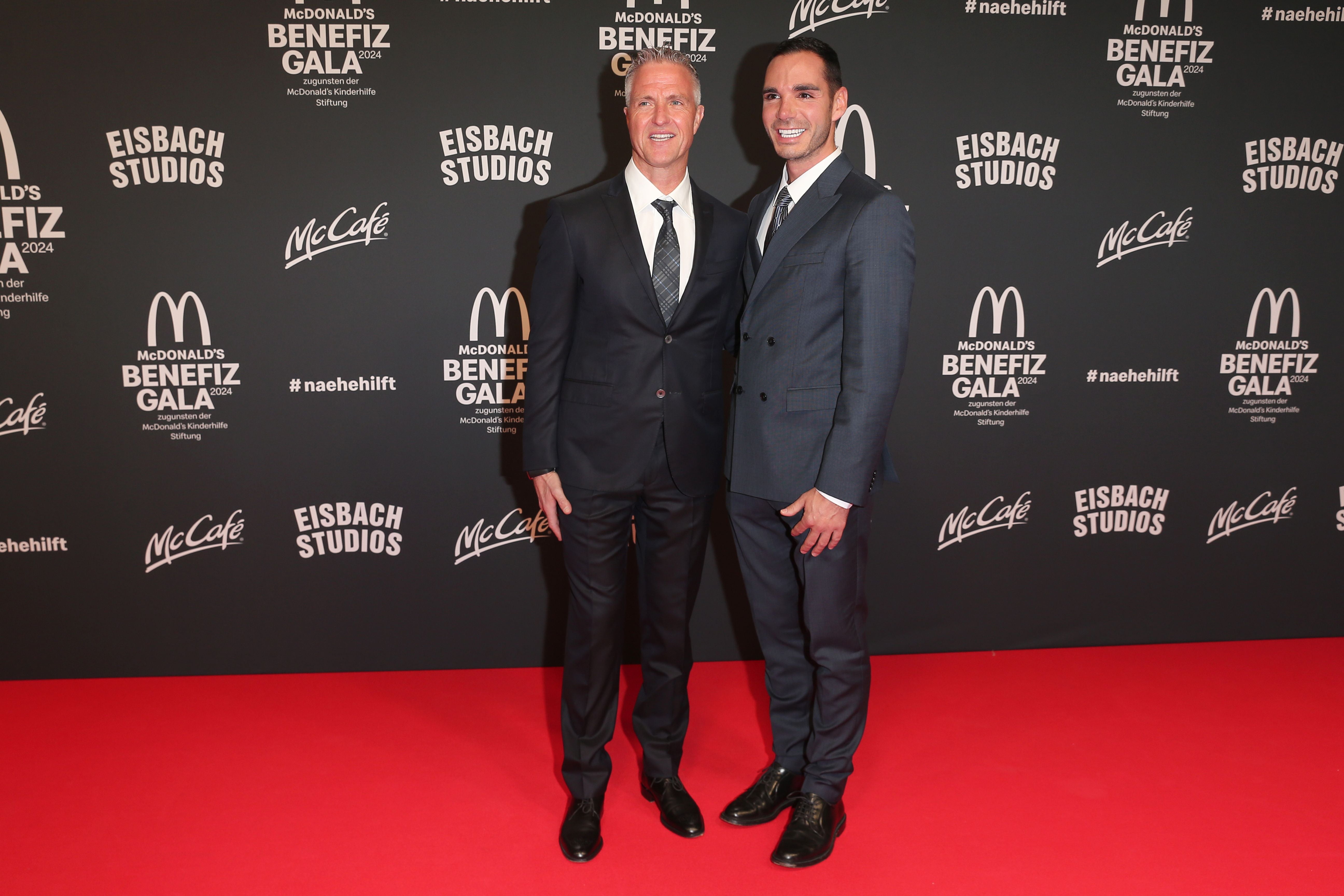 MUNICH, GERMANY - OCTOBER 26: Ralf Schumacher and Etienne Bousquet-Cassagne during the McDonald's KiHi (Kinderhilfe) Benefiz Gala at Eisbach Studios on October 26, 2024 in Munich, Germany. (Photo by Gisela Schober/Getty Images)