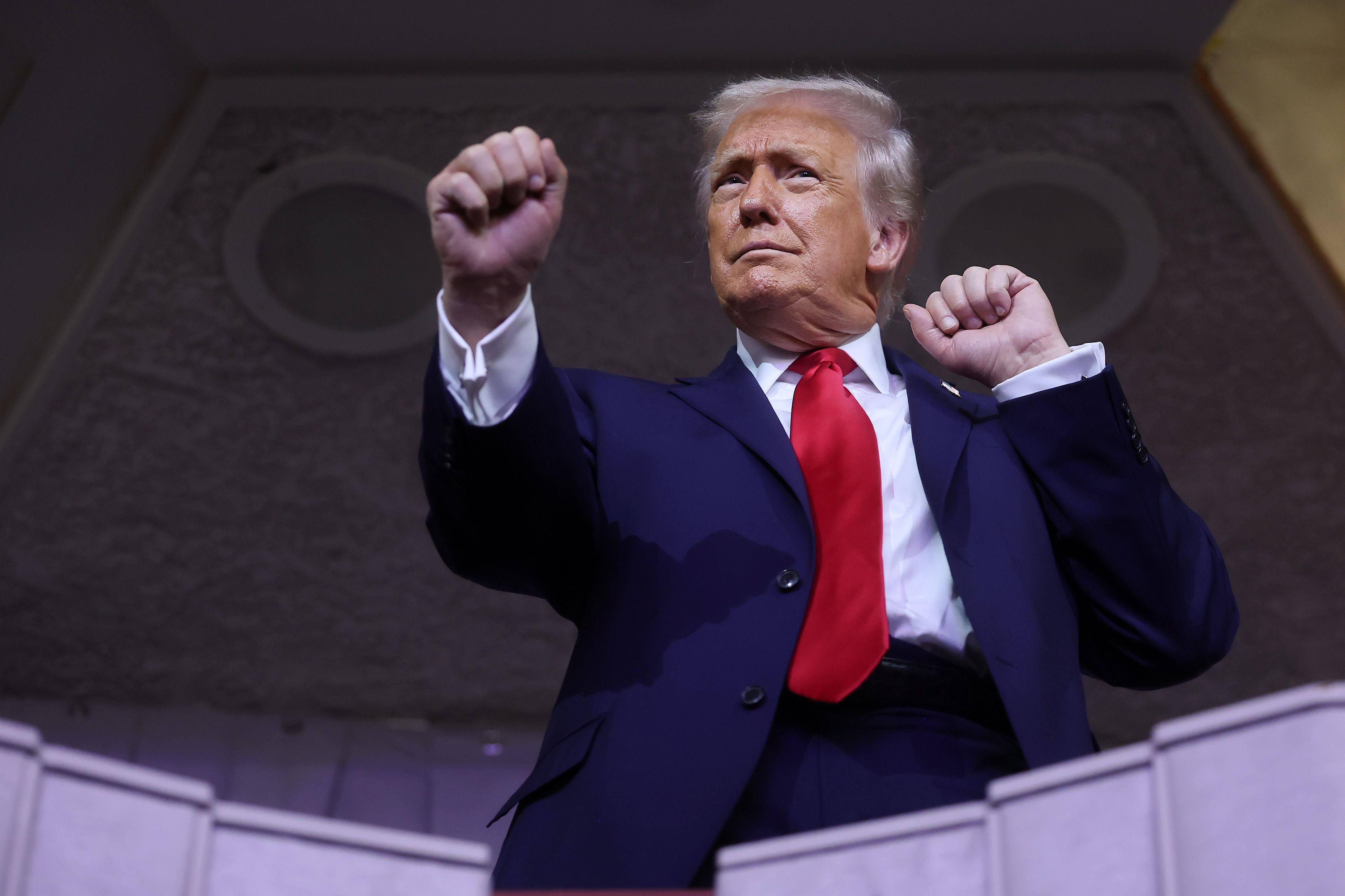WASHINGTON, DC - DECEMBER 05: U.S. President Donald Trump dances to the final performance of the Village People during the FIFA World Cup 2026 Official Draw at John F. Kennedy Center for the Performing Arts on December 05, 2025 in Washington, DC. (Photo by Hector Vivas - FIFA/FIFA via Getty Images)