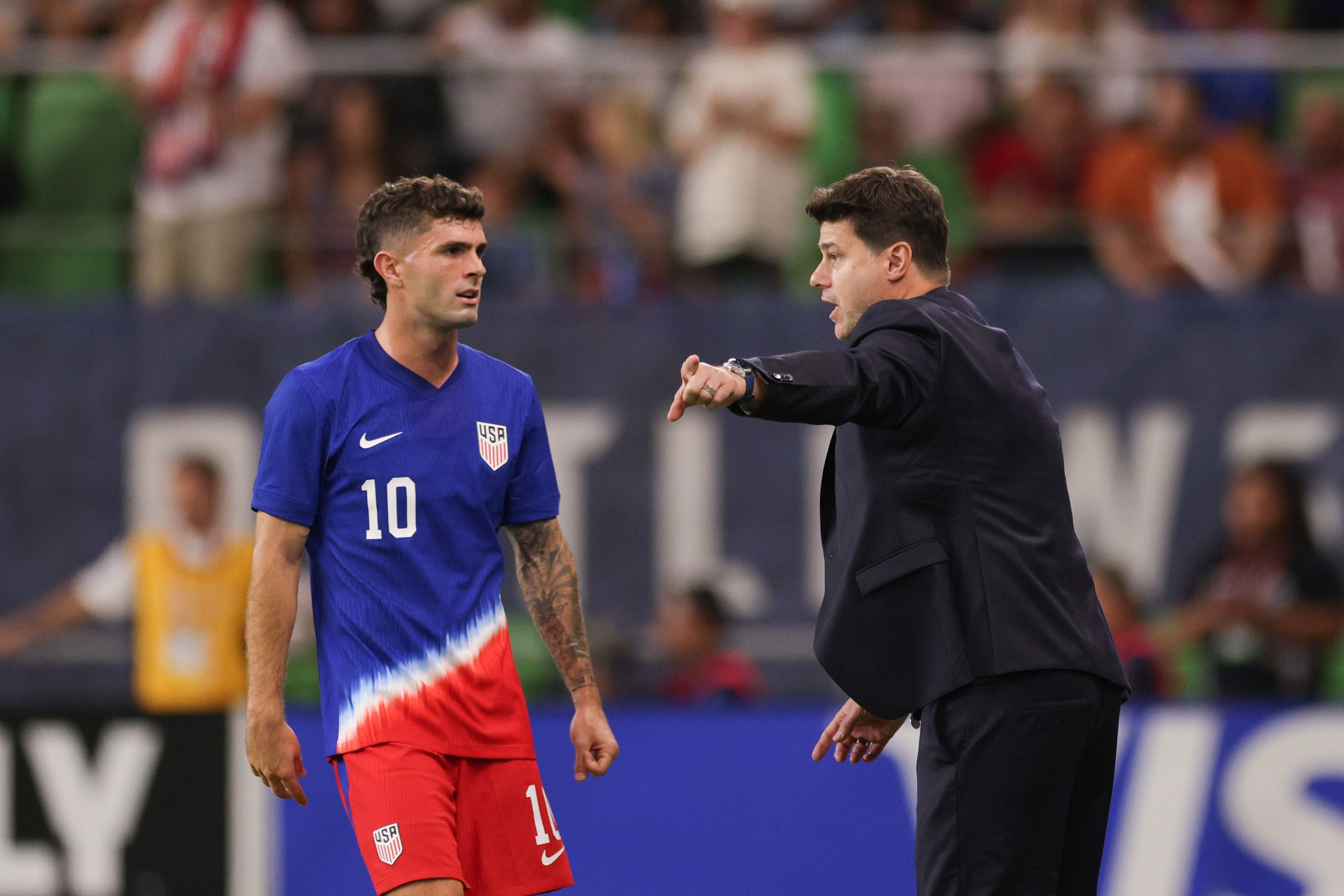 AUSTIN, TEXAS - OCTOBER 12: United States head coach Mauricio Pochettino talks with Christian Pulisic #10 during the first half against Panama at Q2 Stadium on October 12, 2024 in Austin, Texas. (Photo by John Dorton/ISI Photos/USSF/Getty Images)