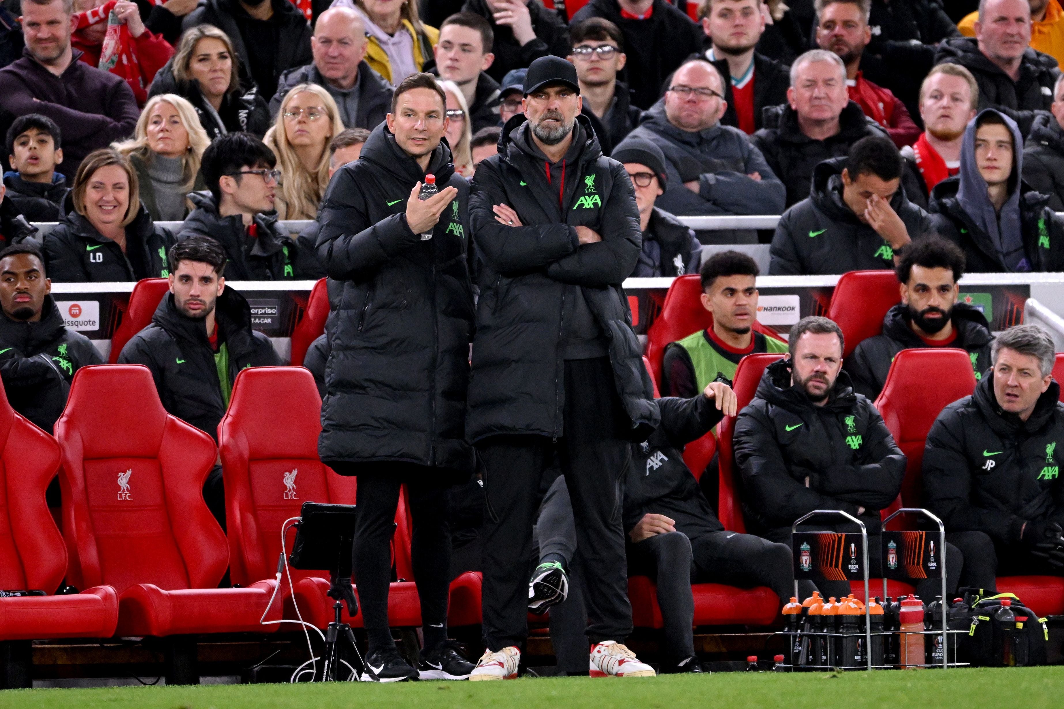 LIVERPOOL, ENGLAND - APRIL 11: Pepijn Lijnders, Assistant Manager of Liverpool, and Jurgen Klopp, Manager of Liverpool, watch on during the UEFA Europa League 2023/24 Quarter-Final first leg match between Liverpool FC and Atalanta at Anfield on April 11, 2024 in Liverpool, England. (Photo by Stu Forster/Getty Images)