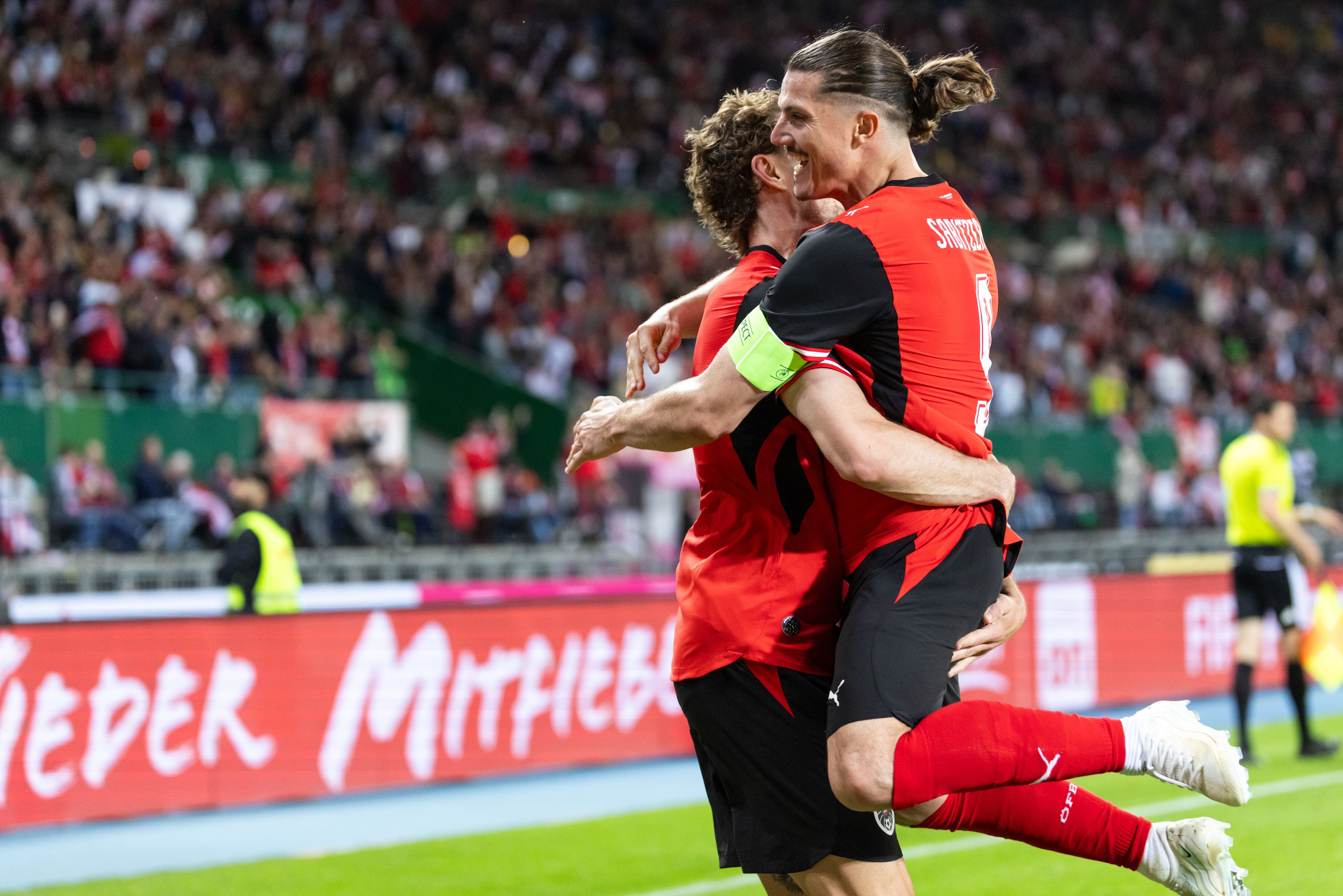 VIENNA,AUSTRIA,01.JUN.26 - SOCCER - OEFB international test match, Austria vs Tunisia. Image shows the rejoicing of Stefan Posch and Marcel Sabitzer (AUT). Photo: GEPA pictures/ Armin Rauthner