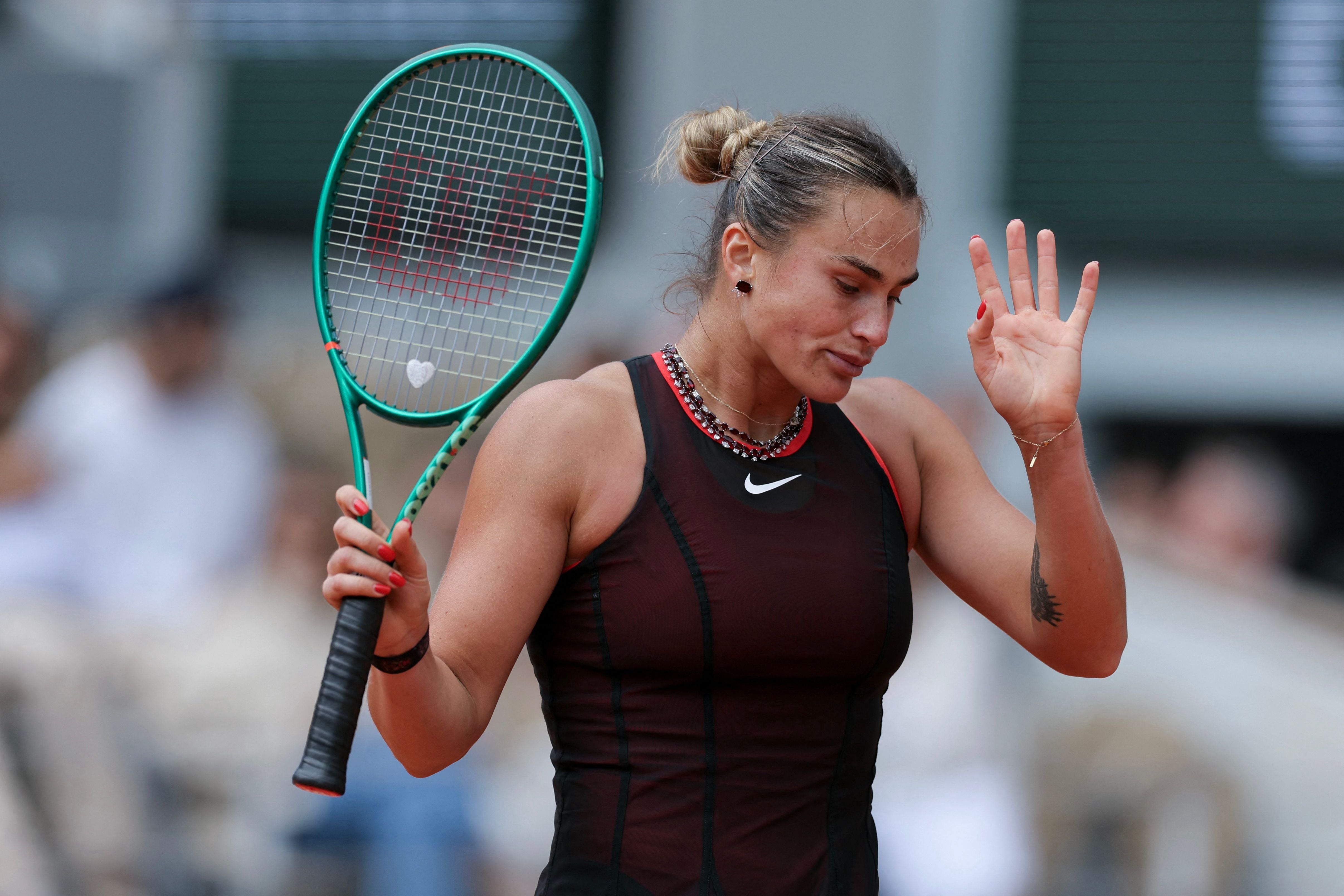 Aryna Sabalenka reacts as she plays against Diana Shnaider during their women's quarter final singles match on day 11 of the French Open tennis tournament on Court Philippe-Chatrier at the Roland-Garros Complex in Paris on June 3, 2026. (Photo by Thomas SAMSON / AFP)