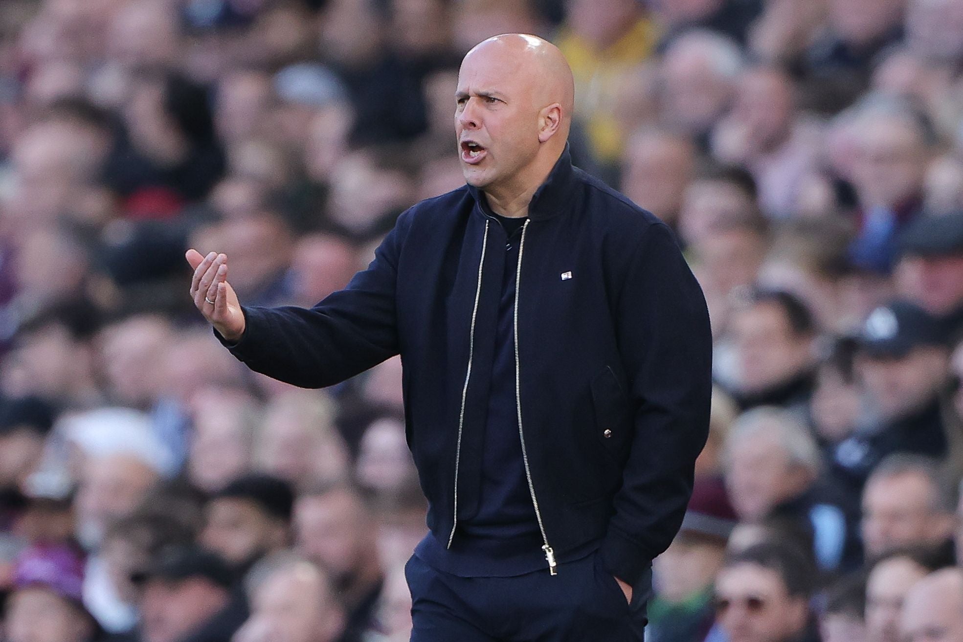 BIRMINGHAM, ENGLAND - MAY 15: Arne Slot, head coach of Liverpool, issues instructions during the Premier League match between Aston Villa and Liverpool at Villa Park on May 15, 2026 in Birmingham, England. (Photo by James Gill - Danehouse/Getty Images)
