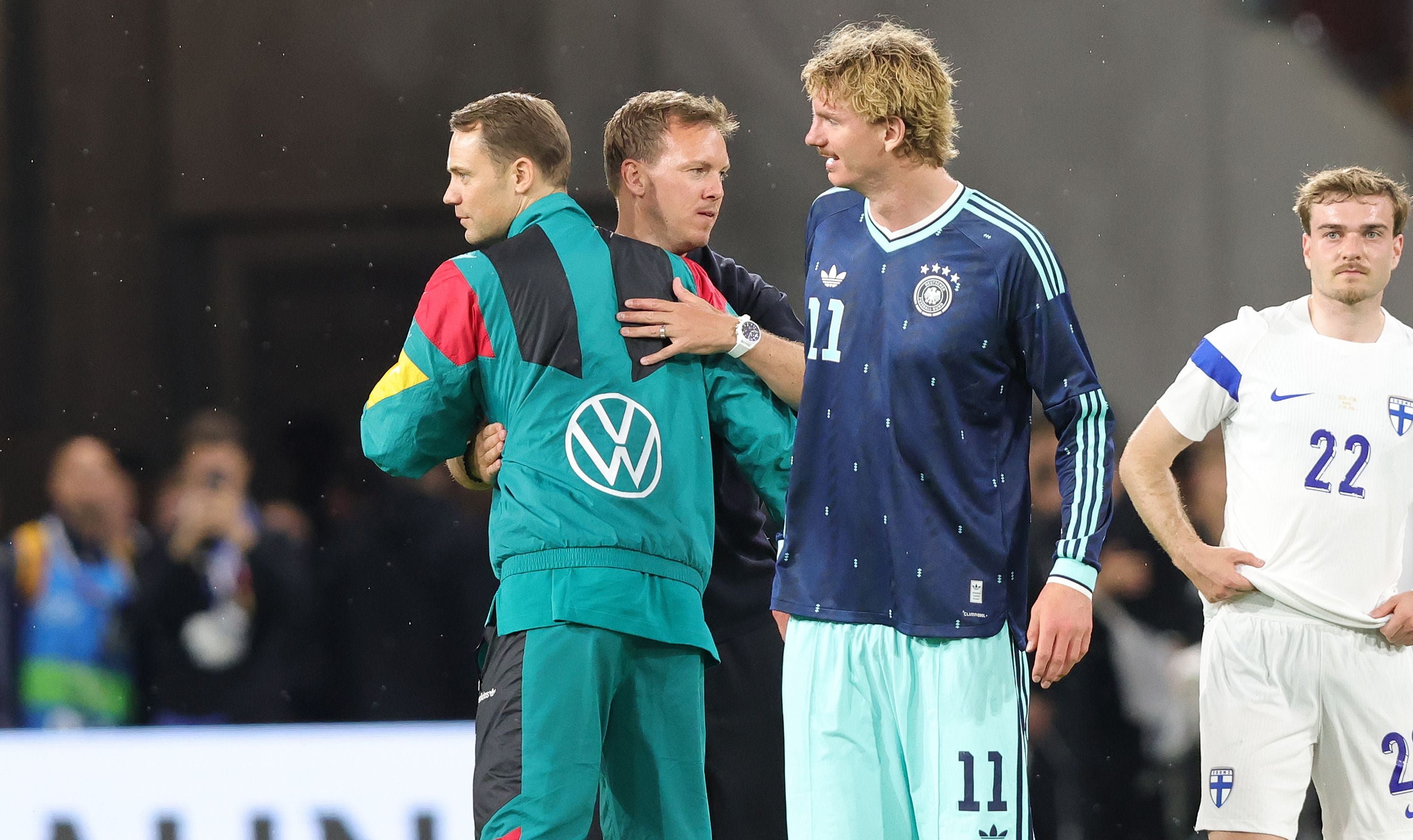 MAINZ, GERMANY - MAY 31: (LR) Goalkeeper Manuel Neuer of Germany, Head Coach Julian Nagelsmann of Germany and Nick Woltemade of Germany celebrate the victory after the international friendly match between Germany and Finland at MEWA Arena on May 31, 2026 in Mainz, Germany. (Photo by Sebastian El-Saqqa - firo sportphoto/Getty Images)