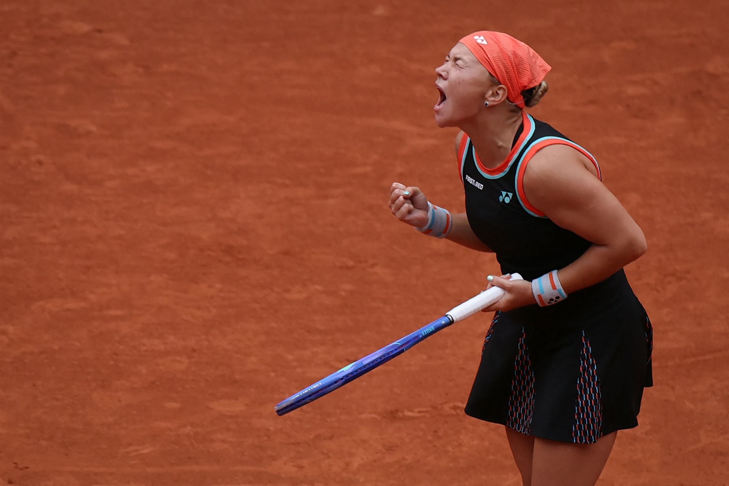 Diana Shnaider reacts to a point against Aryna Sabalenka during their women's quarter final singles match on day 11 of the French Open tennis tournament on Court Philippe-Chatrier at the Roland-Garros Complex in Paris on June 3, 2026. (Photo by Alain JOCARD / AFP)