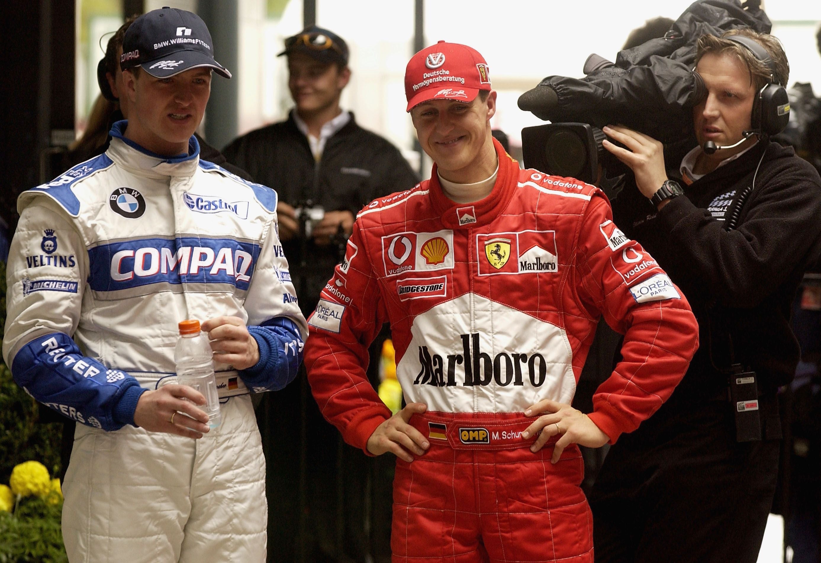 2 Mar 2002: Ralf Schumacherwho qualified third and his brother Michael Schumacher who qualified 2nd talk after the qualifying session for the 2002 Fosters Australian Grand Prix at the Albert Park Circuit, Melbourne, Australia. DIGITAL IMAGE. MandatoryCredit: Robert Cianflone/ALLSPORT