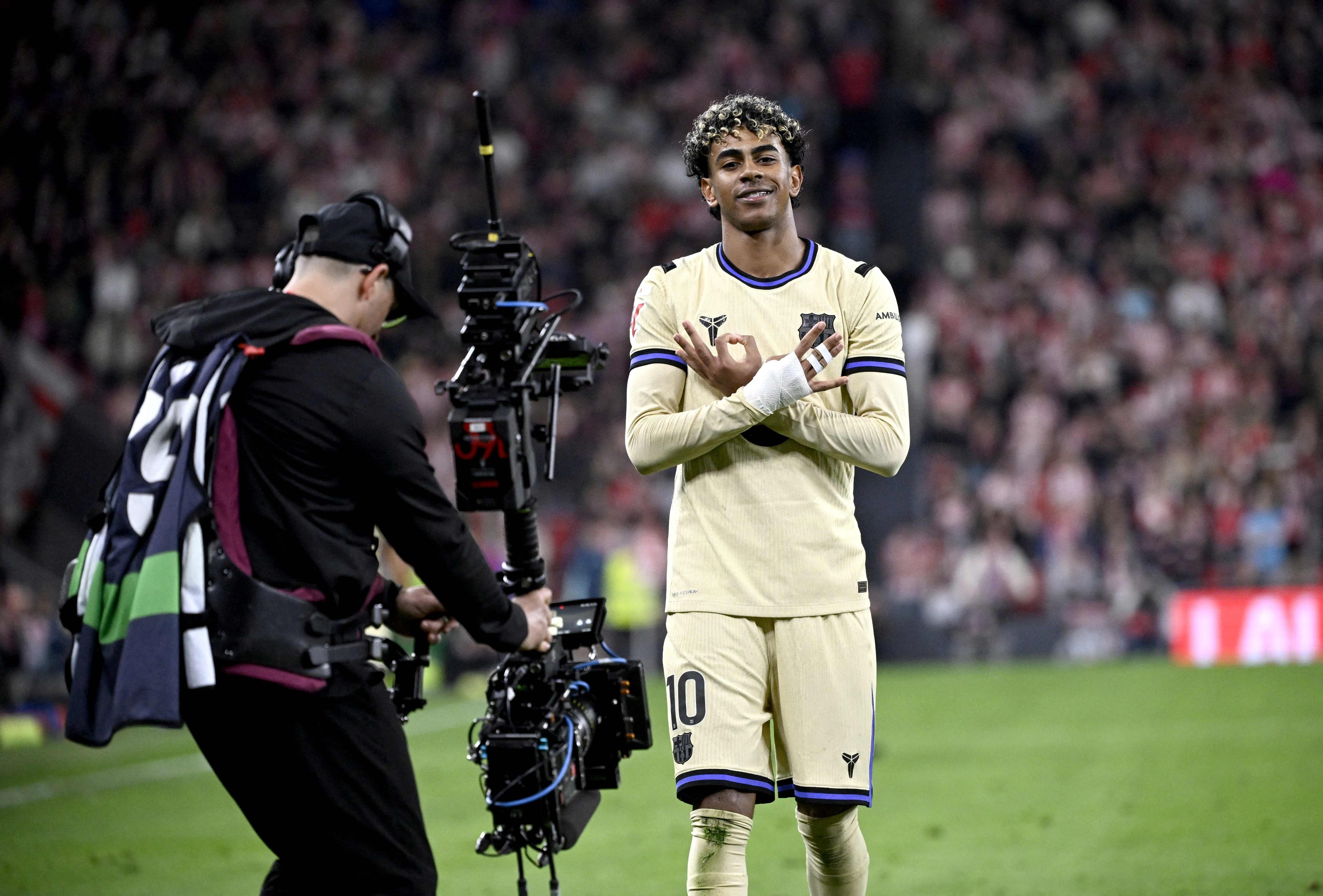 (FILES) Barcelona's Spanish forward #10 Lamine Yamal celebrates scoring his team's first goal during the Spanish league football match between Athletic Club Bilbao and FC Barcelona at San Mames Stadium in Bilbao on March 7, 2026. Spanish coach Luis de la Fuente was convinced on May 26, 2026 that the next World Cup 'is the moment' for the teenage phenomenon Lamine Yamal, AFP reports. (Photo by ANDER GILLENEA / AFP)
