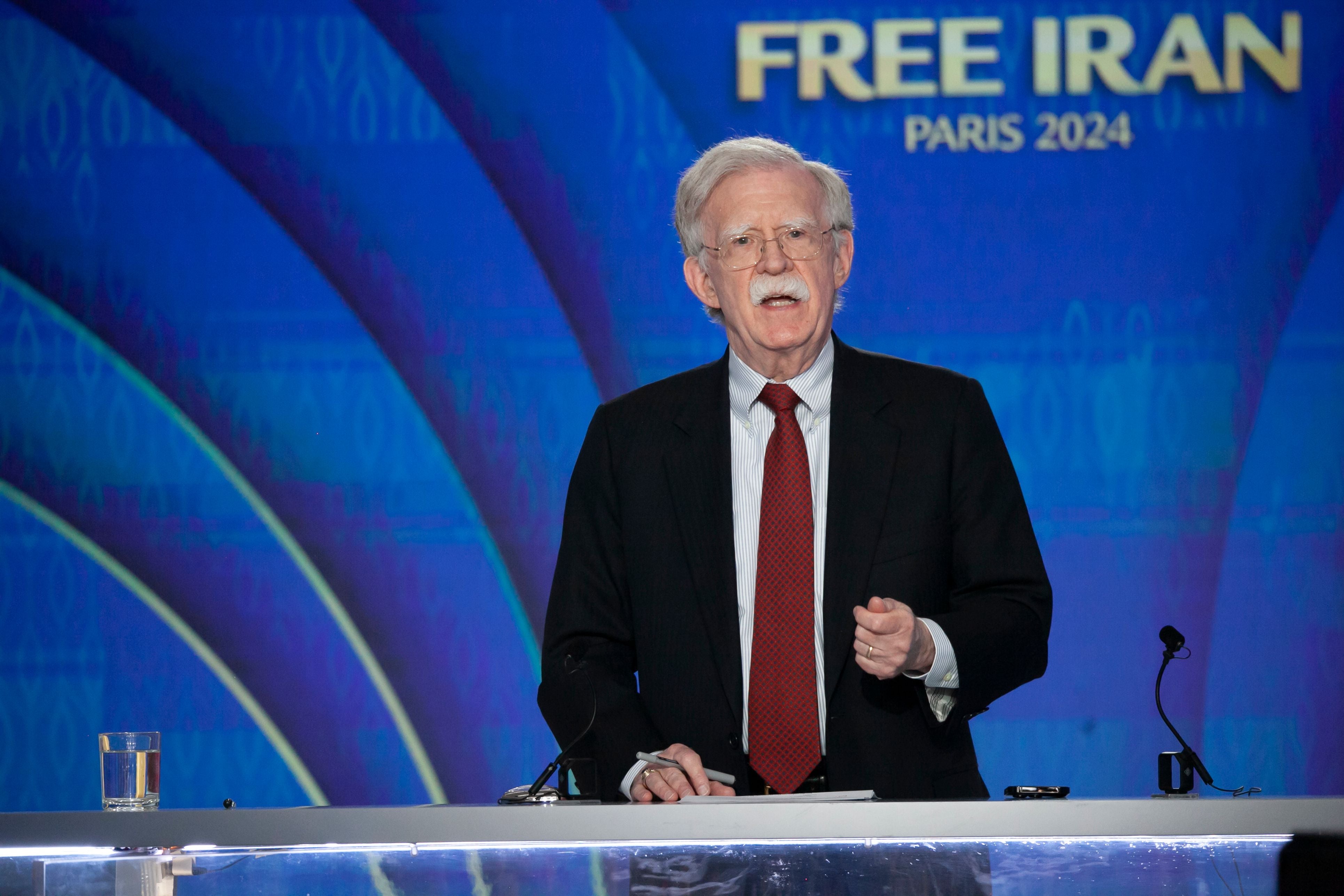 AUVERS-SUR-OISE, FRANCE - 2024/06/29: John Bolton, Former US National Security Advisor speaking at the Summit said, "We know that the NCRI has extraordinary networks inside Iran. I can tell you for over 20 years I have followed very closely what they've said about Iran's nuclear weapons program. They have never once released the information publicly that wasn't true in every material respect". At the National Council of Resistance of Iran (NCRI) headquarters in Auvers-sur-Oise, north of Paris. A 3-day summit bringing together world-renowned prominent speakers will address key topics on the threats posed by the existing regime, the viable alternative, and the imperative of adopting the right policies for the future of Iran and supporting the Ten-Point Plan of Maryam Rajavi. (Photo by Siavosh Hosseini/SOPA Images/LightRocket via Getty Images)