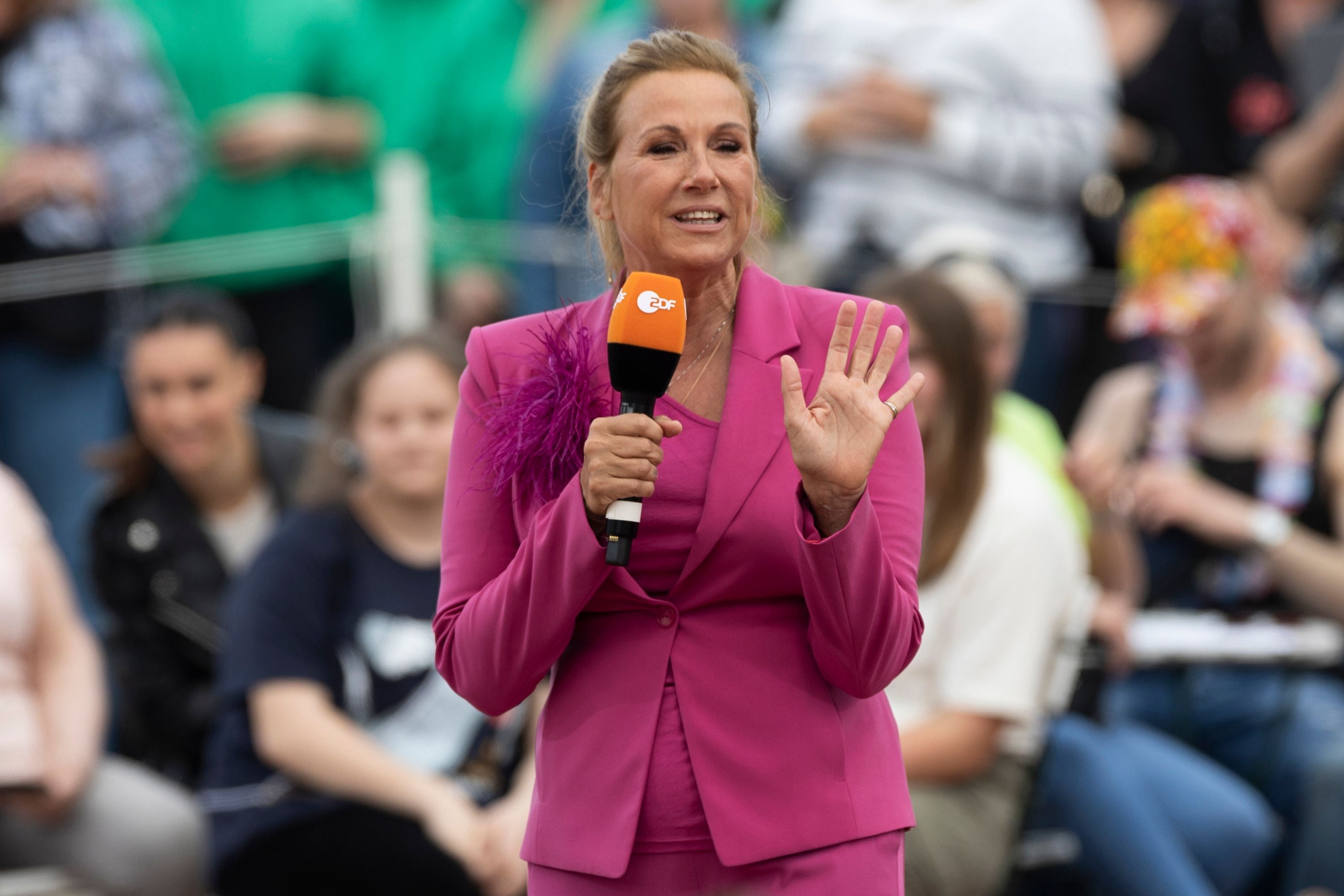 MAINZ, GERMANY - MAY 07: Moderatorin Andrea Kiewel is on stage during the ZDF Fernsehgarten TV Show on May 7, 2023 in Mainz, Germany. (Photo by Marco Steinbrenner/DeFodi Images via Getty Images)