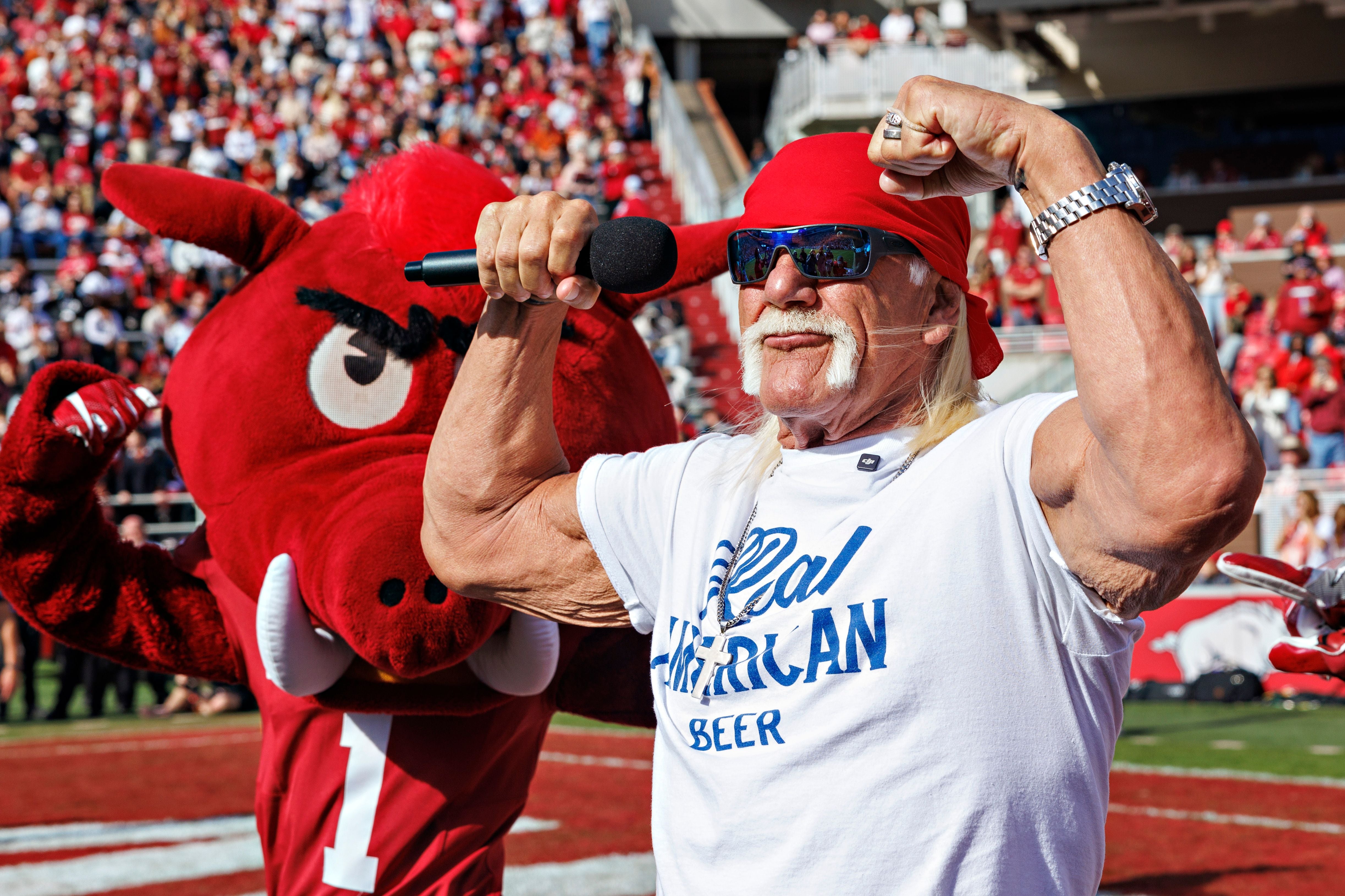 FAYETTEVILLE, ARKANSAS - NOVEMBER 16: Hulk Hogan is introduced during the Texas Longhorns versus the Arkansas Razorbacks at Donald W. Reynolds Razorback Stadium on November 16, 2024 in Fayetteville, Arkansas. The Longhorns defeated the Razorbacks 20-10. (Photo by Wesley Hitt/Getty Images)
