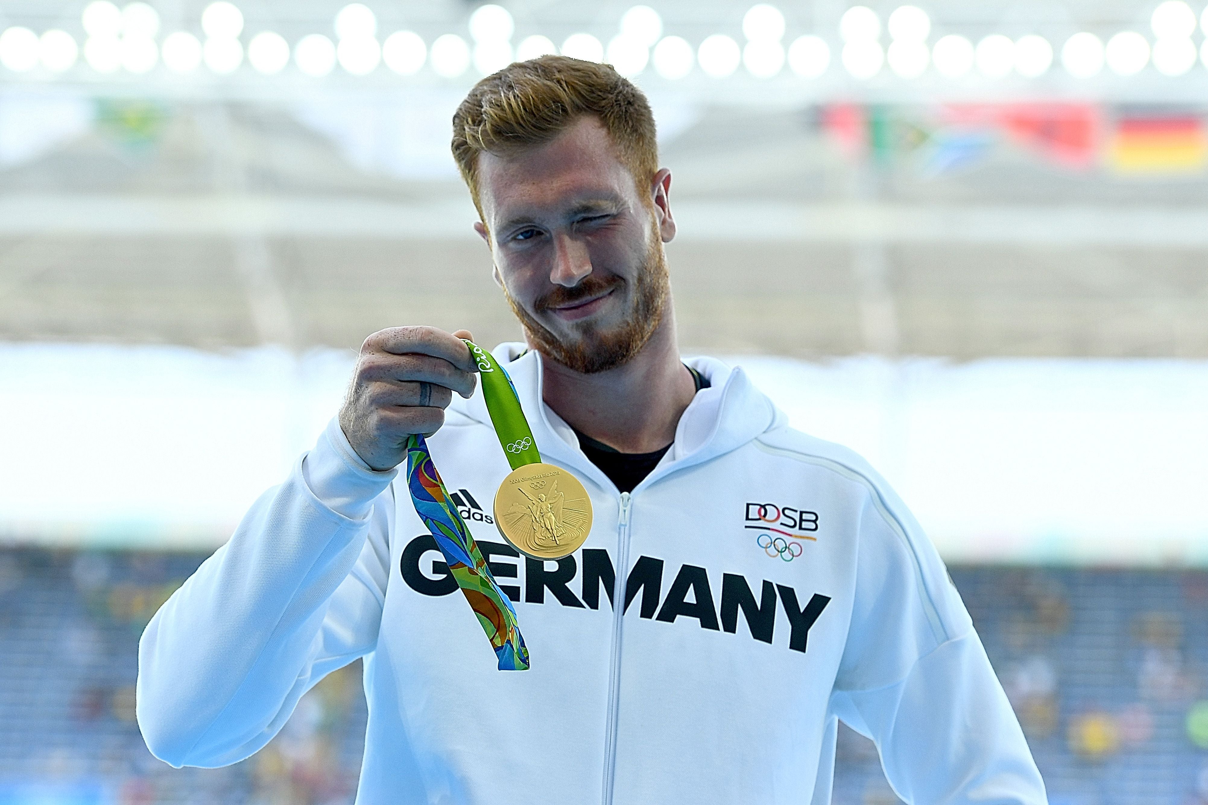 RIO DE JANEIRO, BRAZIL - AUGUST 13: Gold medalist Christoph Harting of Germany poses on the podium during the medal ceremony for the Men's Discus Throw Final on Day 8 of the Rio 2016 Olympic Games at the Olympic Stadium on August 13, 2016 in Rio de Janeiro, Brazil. (Photo by Quinn Rooney/Getty Images)