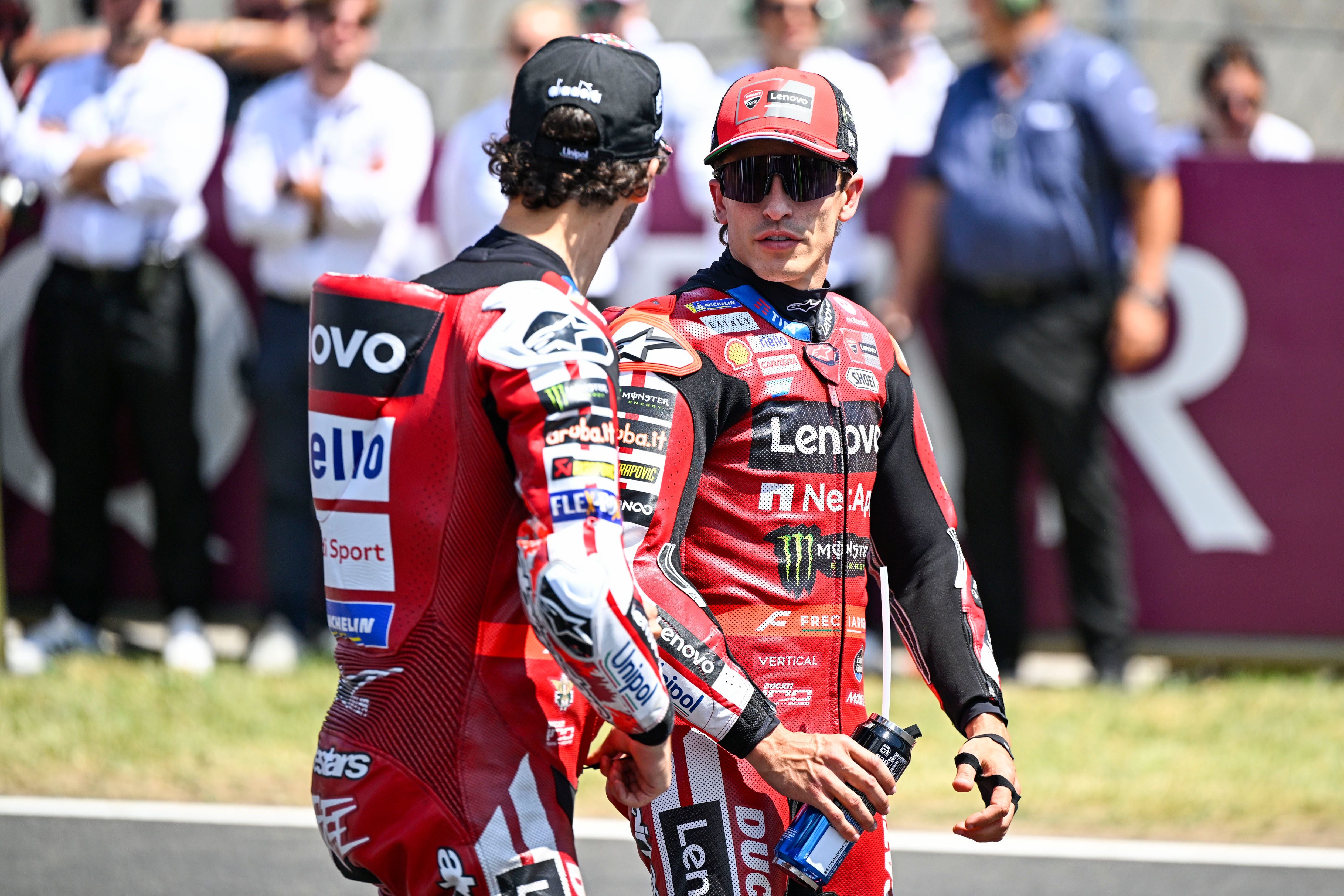 BALATONBOGLAR, HUNGARY - JUNE 07: Francesco Bagnaia of Italy riding the Lenovo Ducati (63) and Marc Marquez of Spain riding the Lenovo Ducati (93) on the grid during the MotoGP of Hungary at Balaton Park Circuit on June 07, 2026 in Balatonboglar, Hungary. (Photo by Gold &amp; Goose Photography/Getty Images)