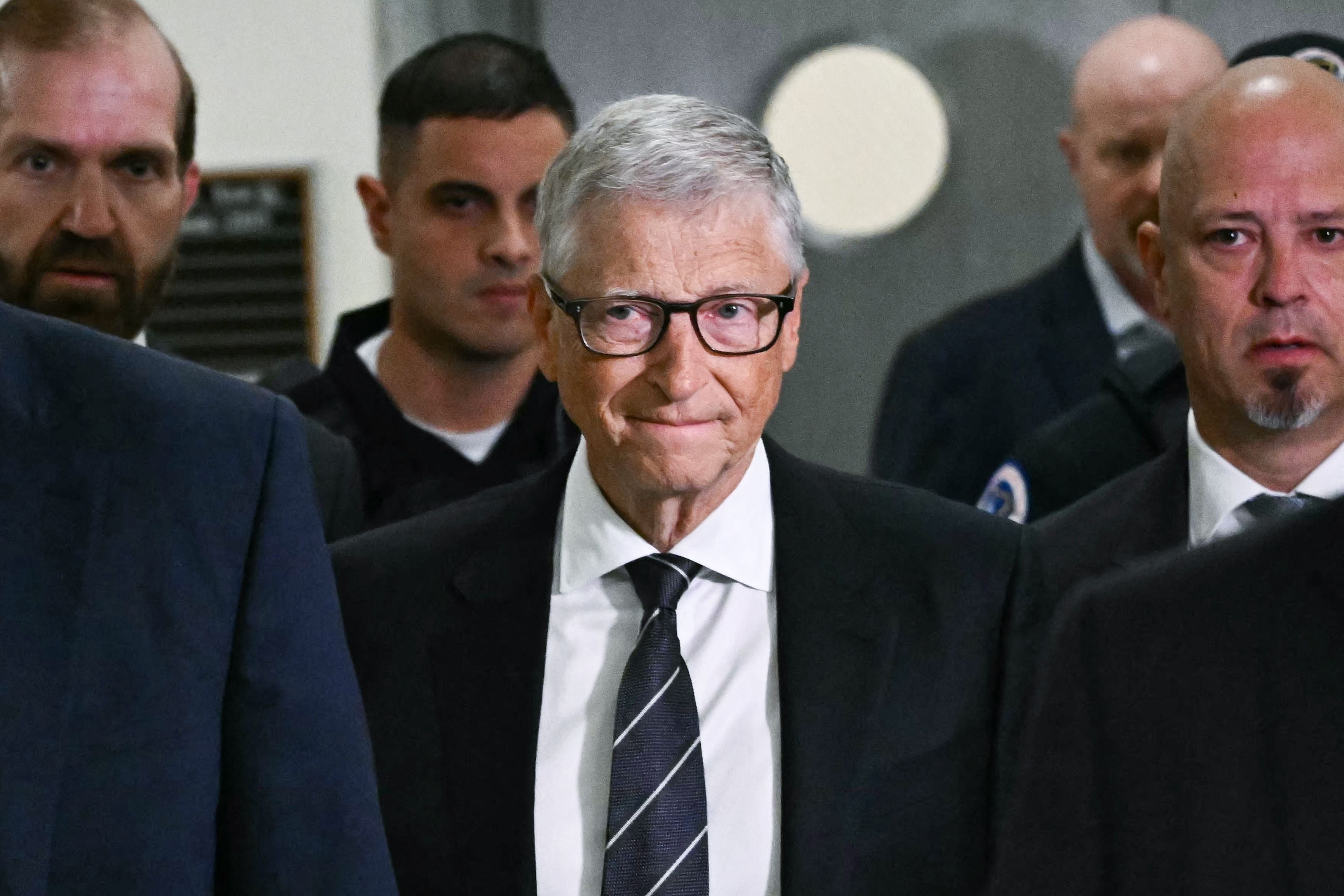 Microsoft co-founder Bill Gates (C) arrives for a closed-door interview with the House Oversight Committee on Capitol Hill in Washington, DC, on June 10, 2026. Gates is set to face questioning Wednesday from US lawmakers over his relationship with late sex offender Jeffrey Epstein, whose network of wealthy and powerful associates has fueled years of scrutiny and conspiracy theories. Gates, one of the world's richest men and a leading philanthropist, is appearing before the House Oversight Committee for a transcribed interview about the disgraced financier, who died in a New York jail cell in 2019 while awaiting trial on sex trafficking charges involving underage girls. (Photo by Kent NISHIMURA / AFP)