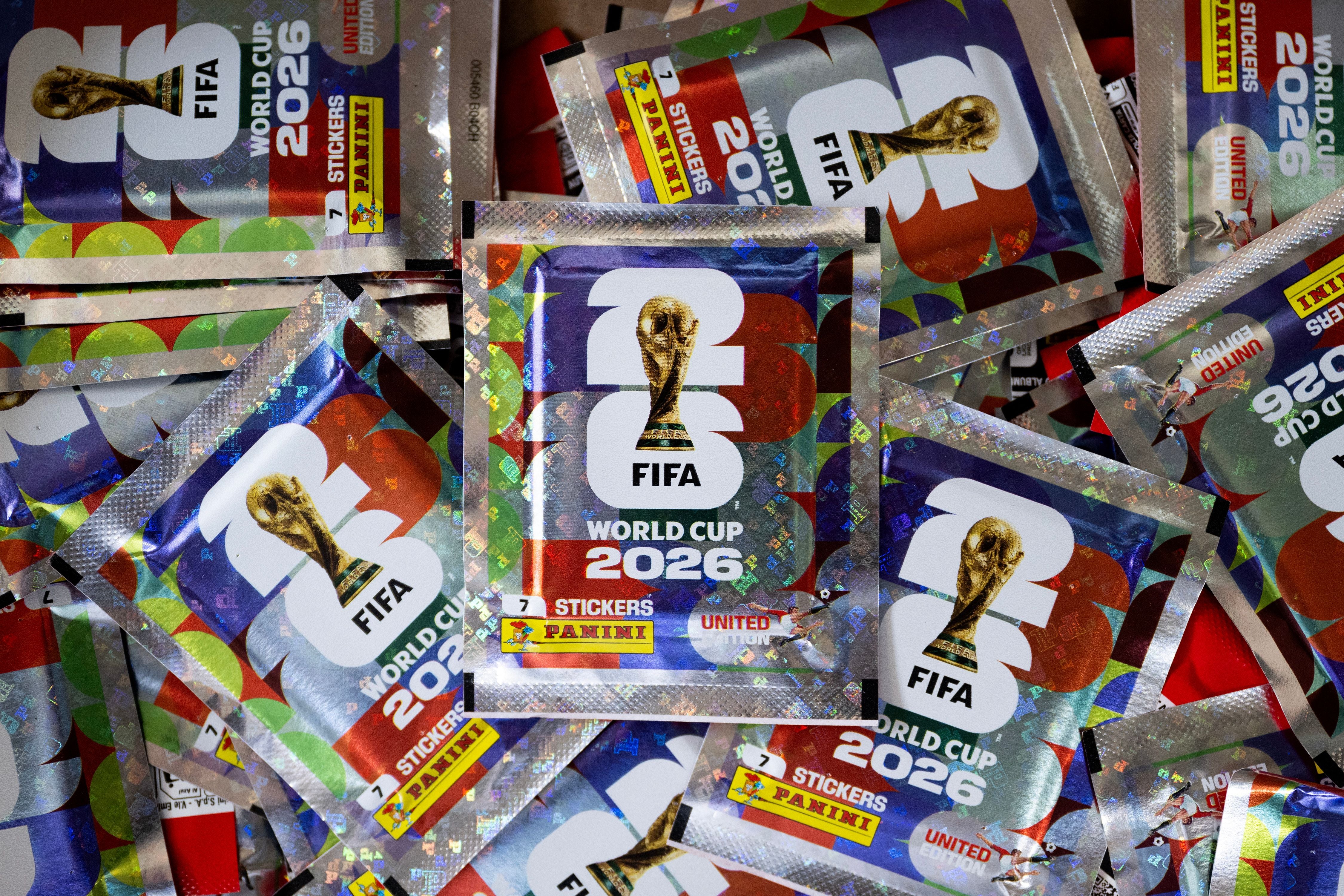 Sticker packets for collectible cards featuring football players for the upcoming 2026 FIFA World Cup hosted by the US, Canada and Mexico, are pictured at the Panini Group factory in Modena, northern Italy, on April 28, 2026. The Panini Group holds the exclusive rights for the official collectible cards and stickers for the 2026 FIFA World Cup hosted by the US, Canada, and Mexico. (Photo by MARCO BERTORELLO / AFP)