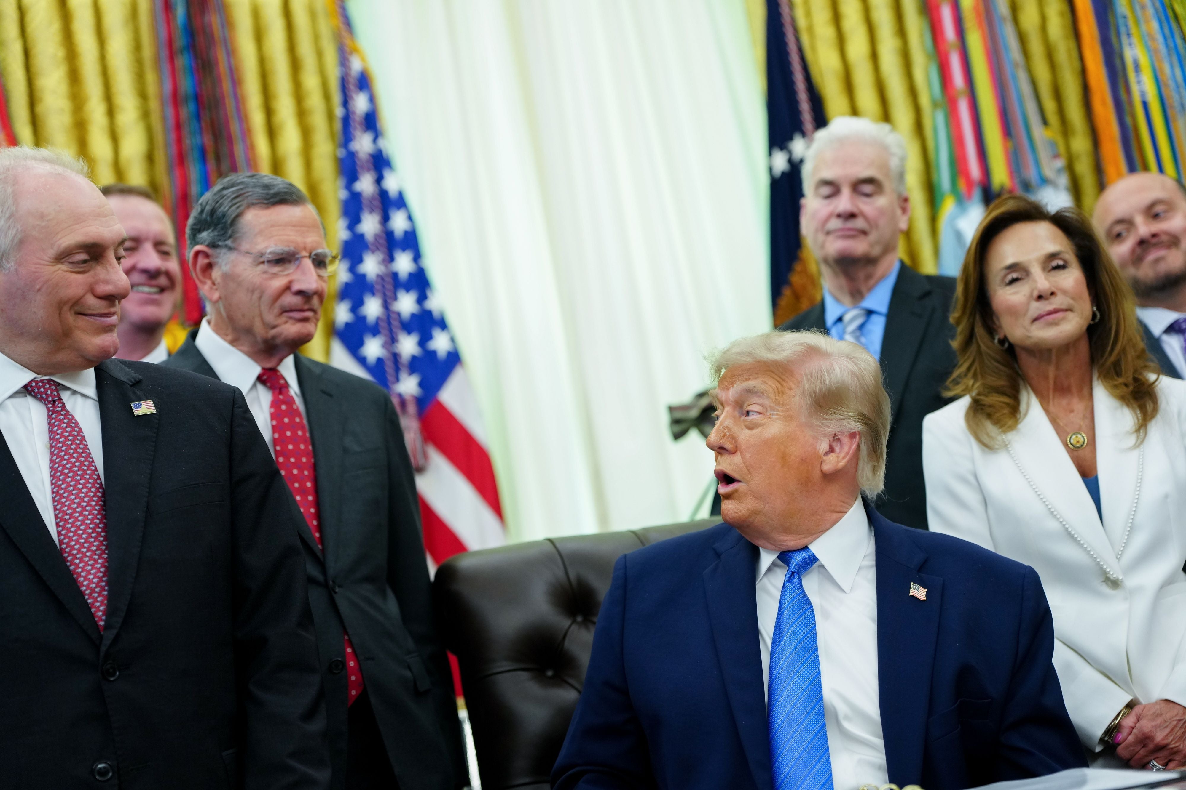 epa13028728 US President Donald Trump speaks during a signing ceremony for the "Secure America Act" in the Oval Office of the White House in Washington, DC, USA, 10 June 2026. The act requires proof of citizenship to register to vote. EPA/AARON SCHWARTZ / POOL