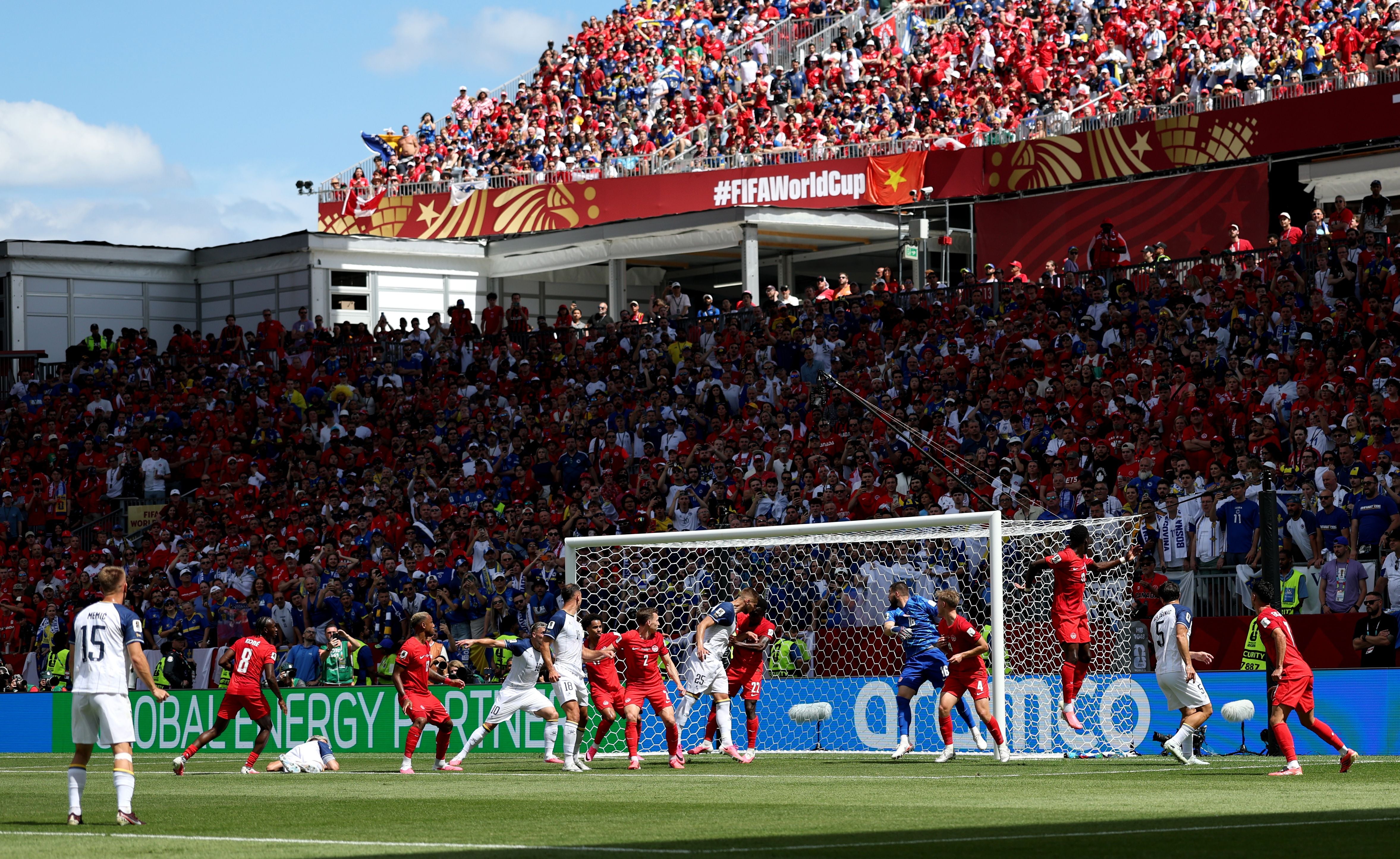 TORONTO, ONTARIO - JUNE 12: Jovo Lukic #25 of Bosnia and Herzegovina scores his team's first goal off a header during the FIFA World Cup 2026 Group B match between Canada and Bosnia and Herzegovina at Toronto Stadium on June 12, 2026 in Toronto, Ontario. (Photo by Joosep Martinson - FIFA/FIFA via Getty Images)