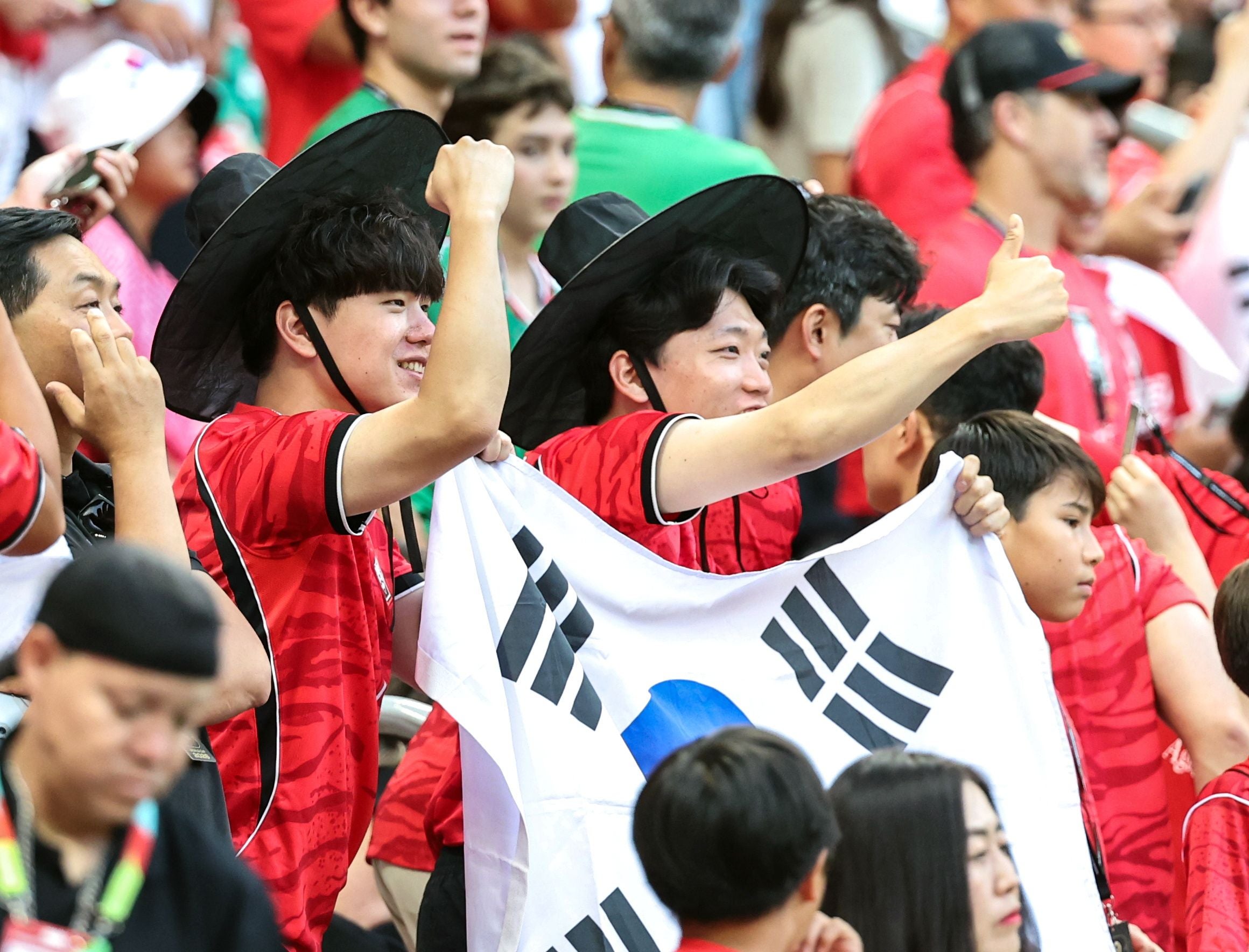 epa13031738 South Korean fans donning 'gat,' a traditional Korean hat, cheer for their team ahead of a World Cup Group A football match between South Korea and Czechia at Estadio Guadalajara in Zapopan, Mexico, 11 June 2026. EPA/YONHAP SOUTH KOREA OUT