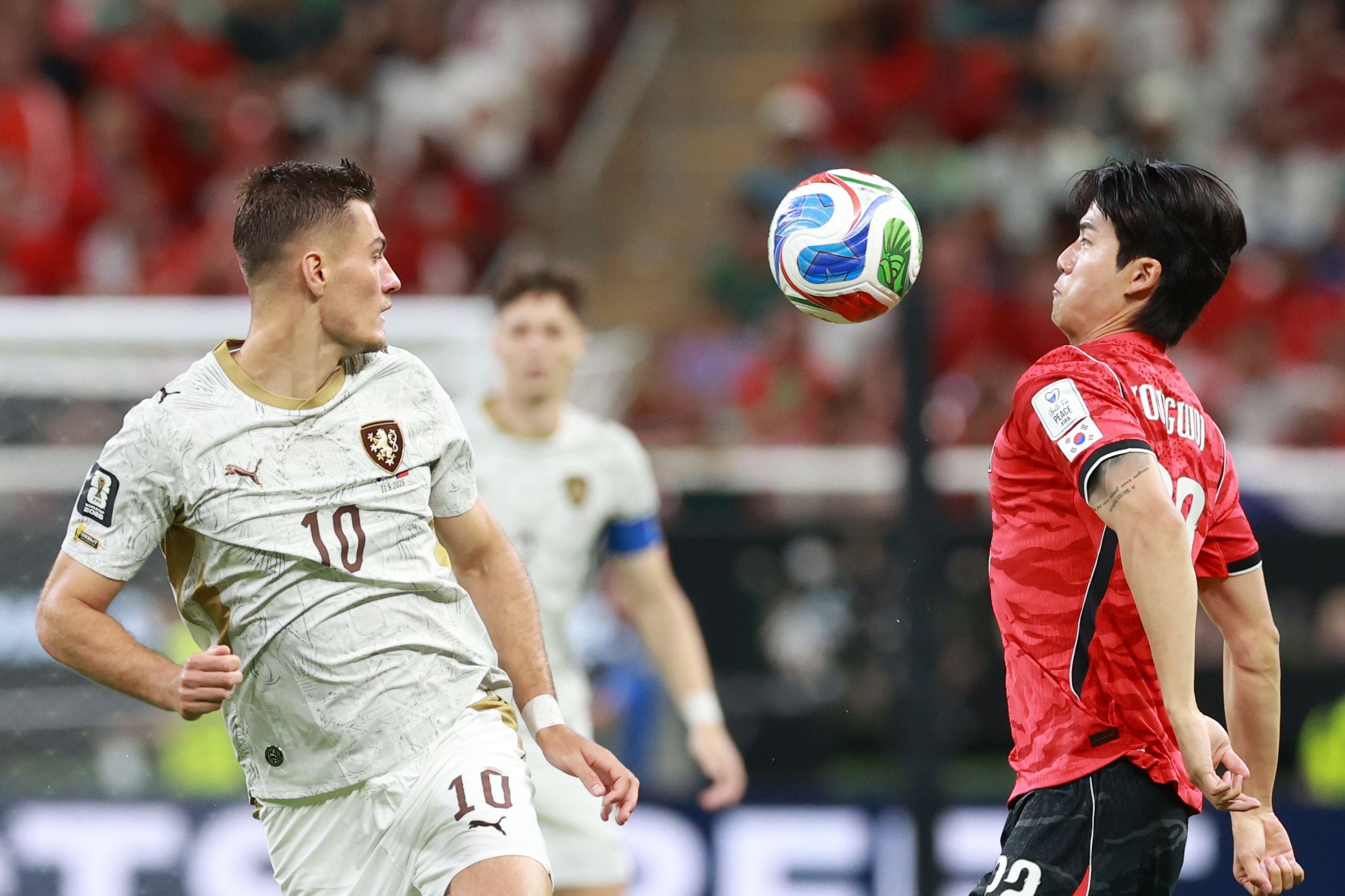 epa13031750 Seol Youngwoo (R) of South Korea vies for the ball with Patrik Schick (L) of Czechia during the FIFA World Cup 2026 Group A match between South Korea and Czechia in Guadalajara, Mexico, 11 June 2026. EPA/ALEX CRUZ