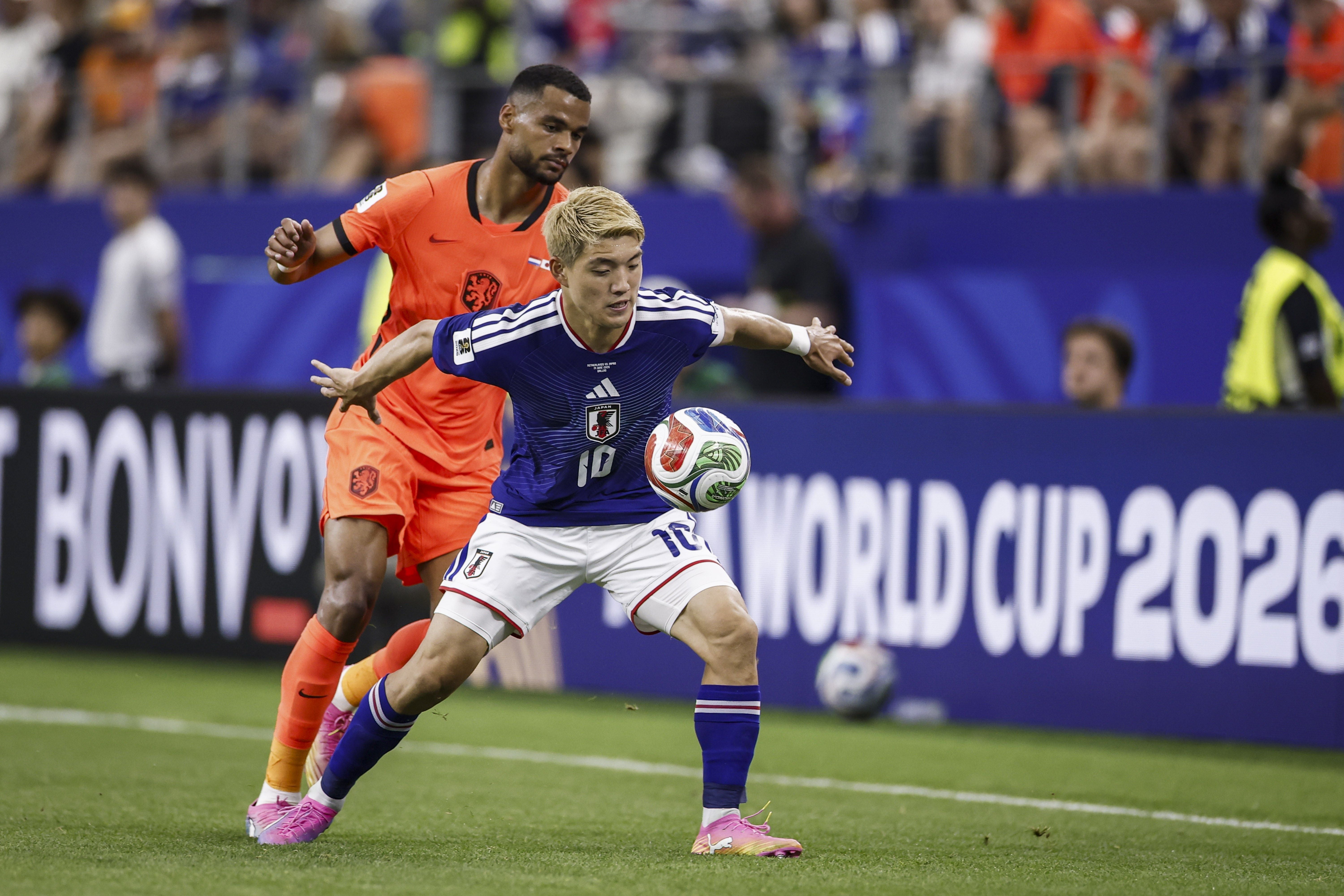 ARLINGTON - (lr) Cody Gakpo of the Netherlands and Ritsu Doan of Japan during the FIFA 2026 World Cup Group F match between the Netherlands and Japan at Dallas Stadium on June 14, 2026, in Arlington, United States. ROBIN VAN LONKHUIJSEN / ANP (Photo by ANP via Getty Images)