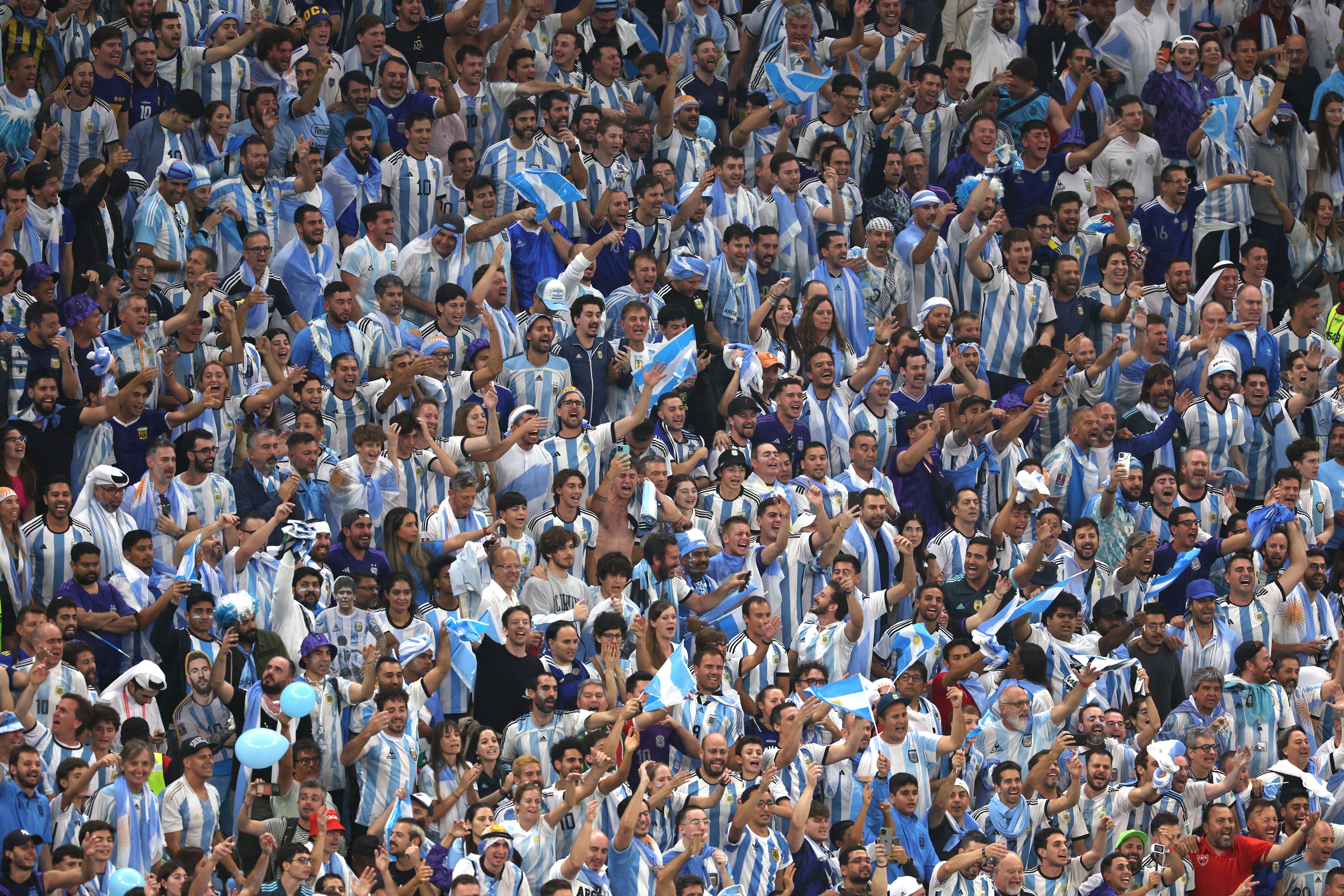 LUSAIL CITY, QATAR - DECEMBER 18: Argentina fans show their support during the FIFA World Cup Qatar 2022 Final match between Argentina and France at Lusail Stadium on December 18, 2022 in Lusail City, Qatar. (Photo by Richard Heathcote/Getty Images)
