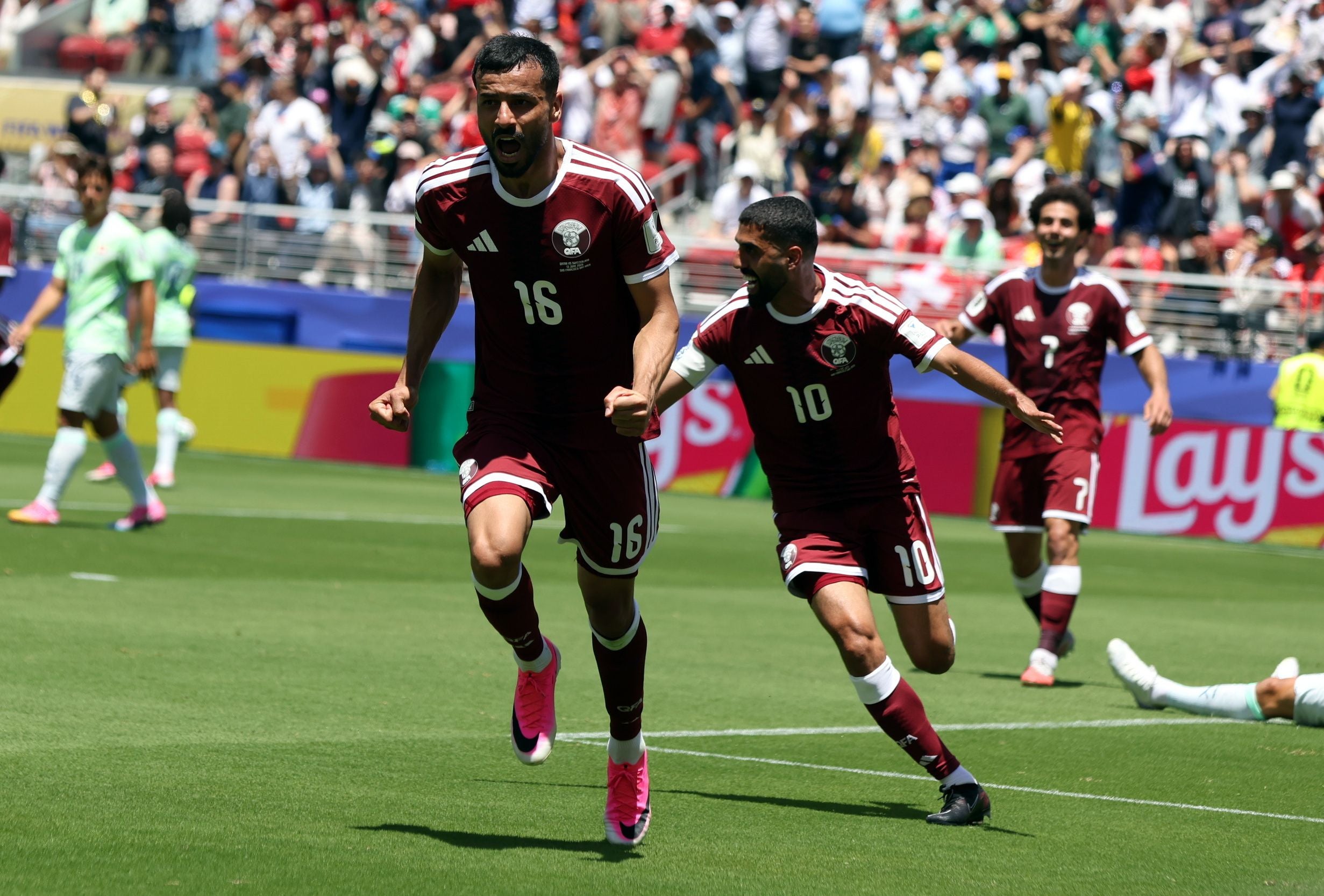epa13035330 Boualem Khoukhi of Qatar (CL) celebrates scoring the 1-1 during the FIFA World Cup 2026 group stage match Qatar against Switzerland, in San Francisco, USA, 13 June 2026. EPA/BENJAMIN FANJOY