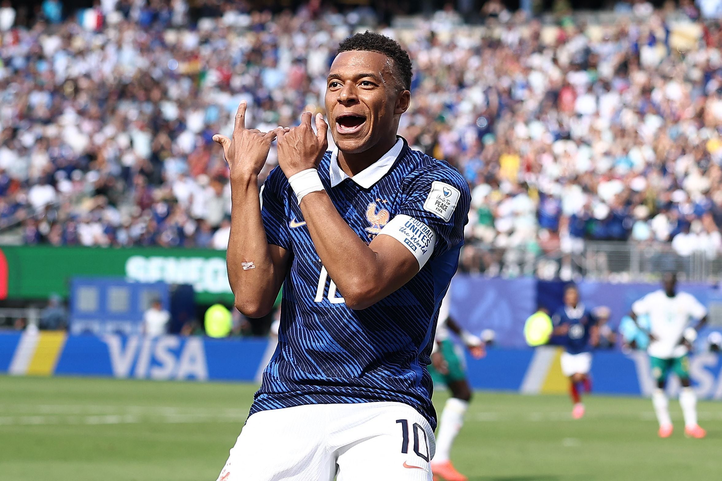 France's forward #10 Kylian Mbappe celebrates after scoring his team's first goal during the 2026 World Cup Group I football match between France and Senegal at the New York/New Jersey Stadium in East Rutherford on June 16, 2026. (Photo by CHARLY TRIBALLEAU / AFP)