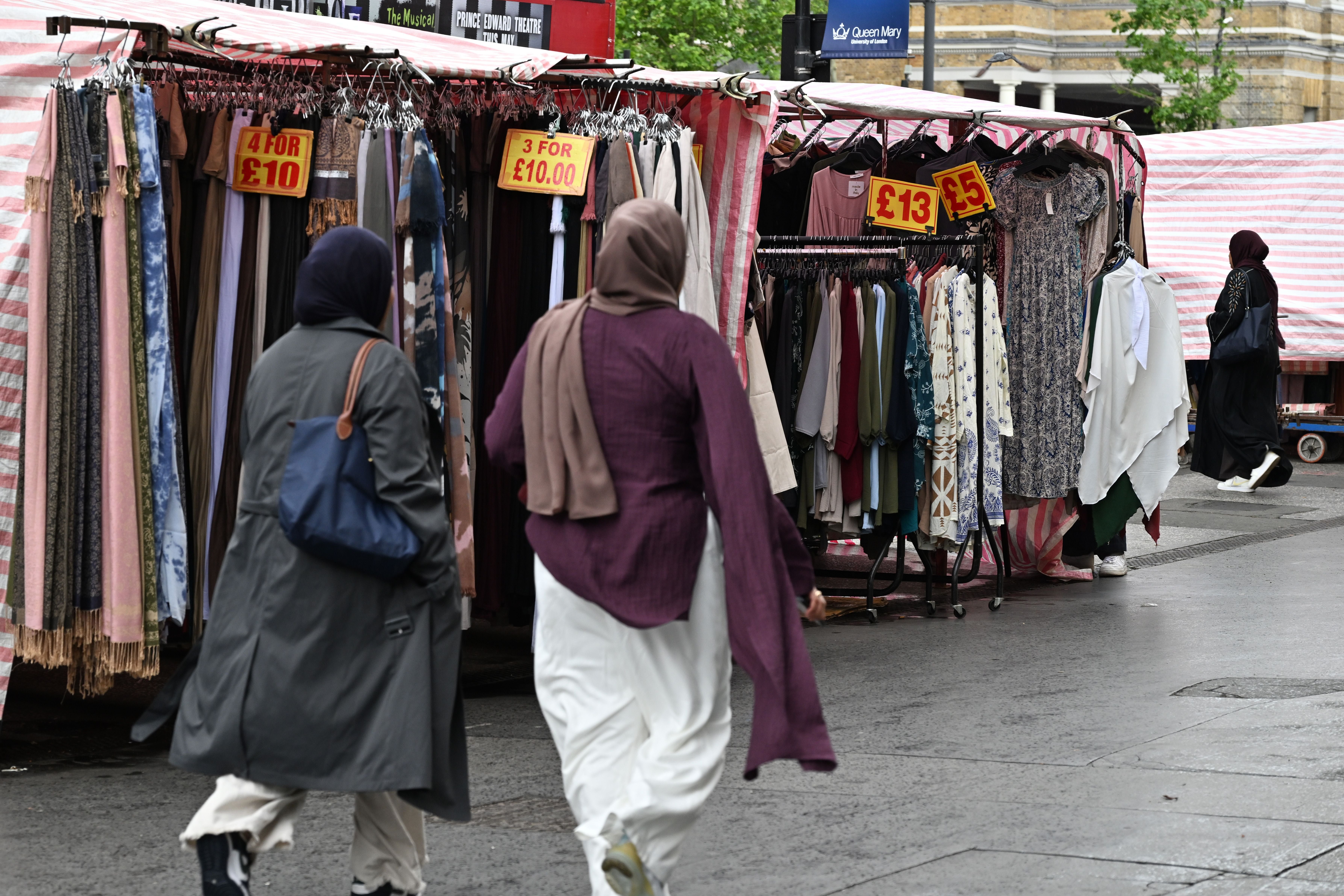 LONDON, ENGLAND - MAY 11: A general view as people shop at clothing stalls at Whitechapel Road market on May 11, 2026 in London, England. (Photo by John Keeble/Getty Images)