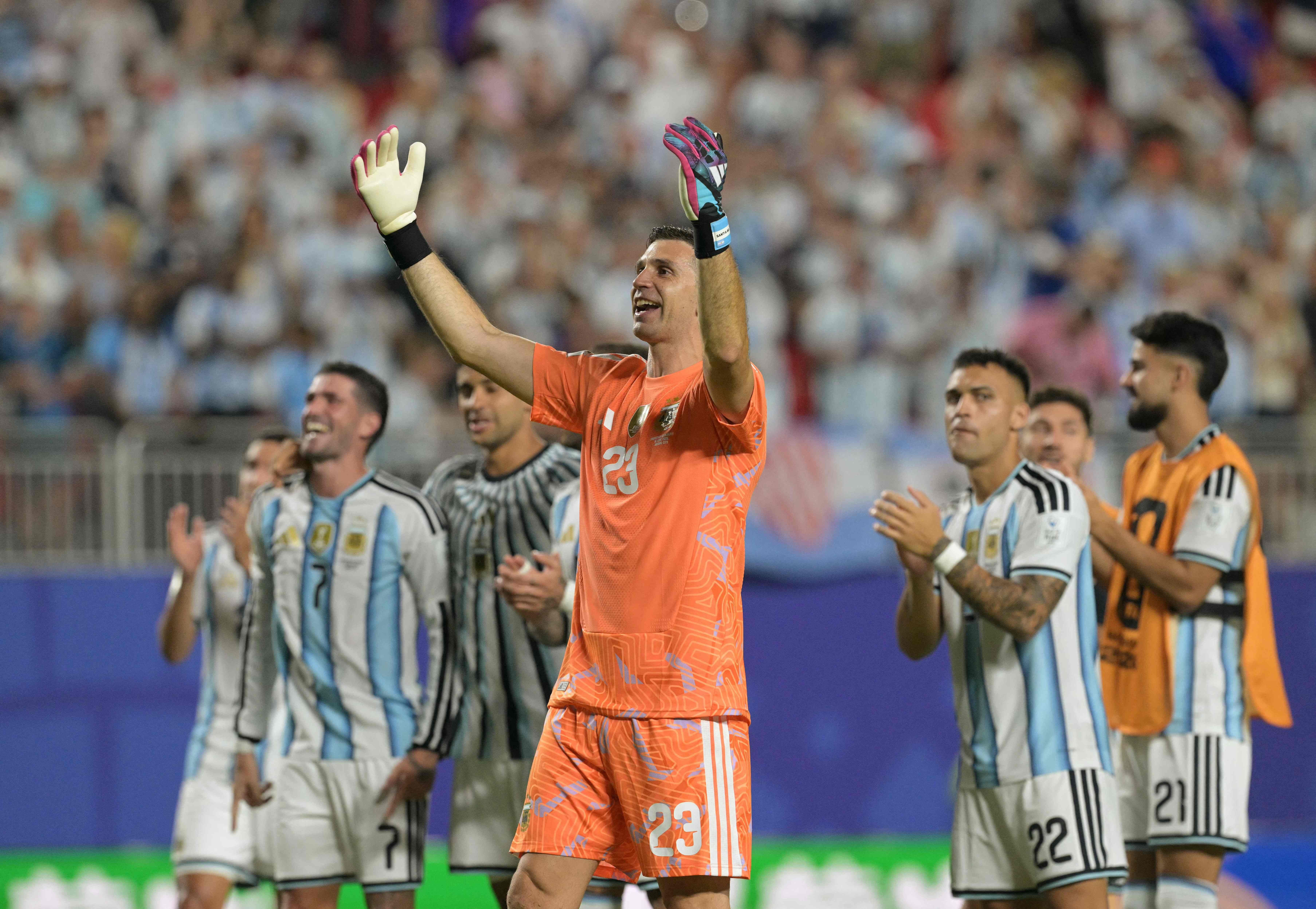 Argentina's goalkeeper #23 Emiliano Martinez celebrates after winning the 2026 World Cup Group J football match between Argentina and Algeria at the Kansas City Stadium in Kansas City on June 16, 2026. (Photo by JUAN MABROMATA / AFP)