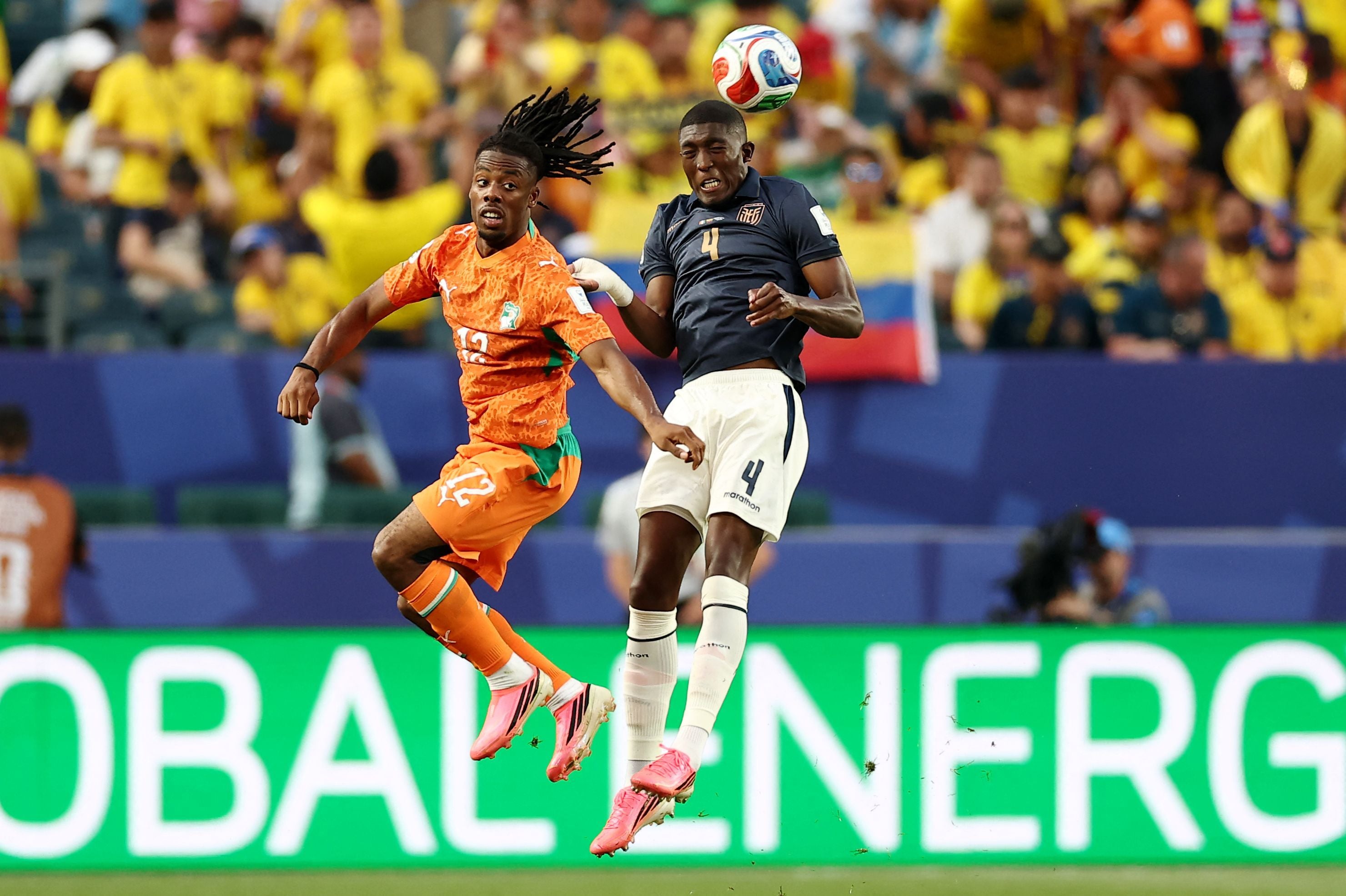 Ivory Coast's forward #12 Elye Wahi and Ecuador's defender #04 Joel Ordonez fight for the ball during the 2026 World Cup Group E football match between Ivory Coast and Ecuador at the Philadelphia Stadium in Philadelphia on June 14, 2026. (Photo by CHARLY TRIBALLEAU / AFP)