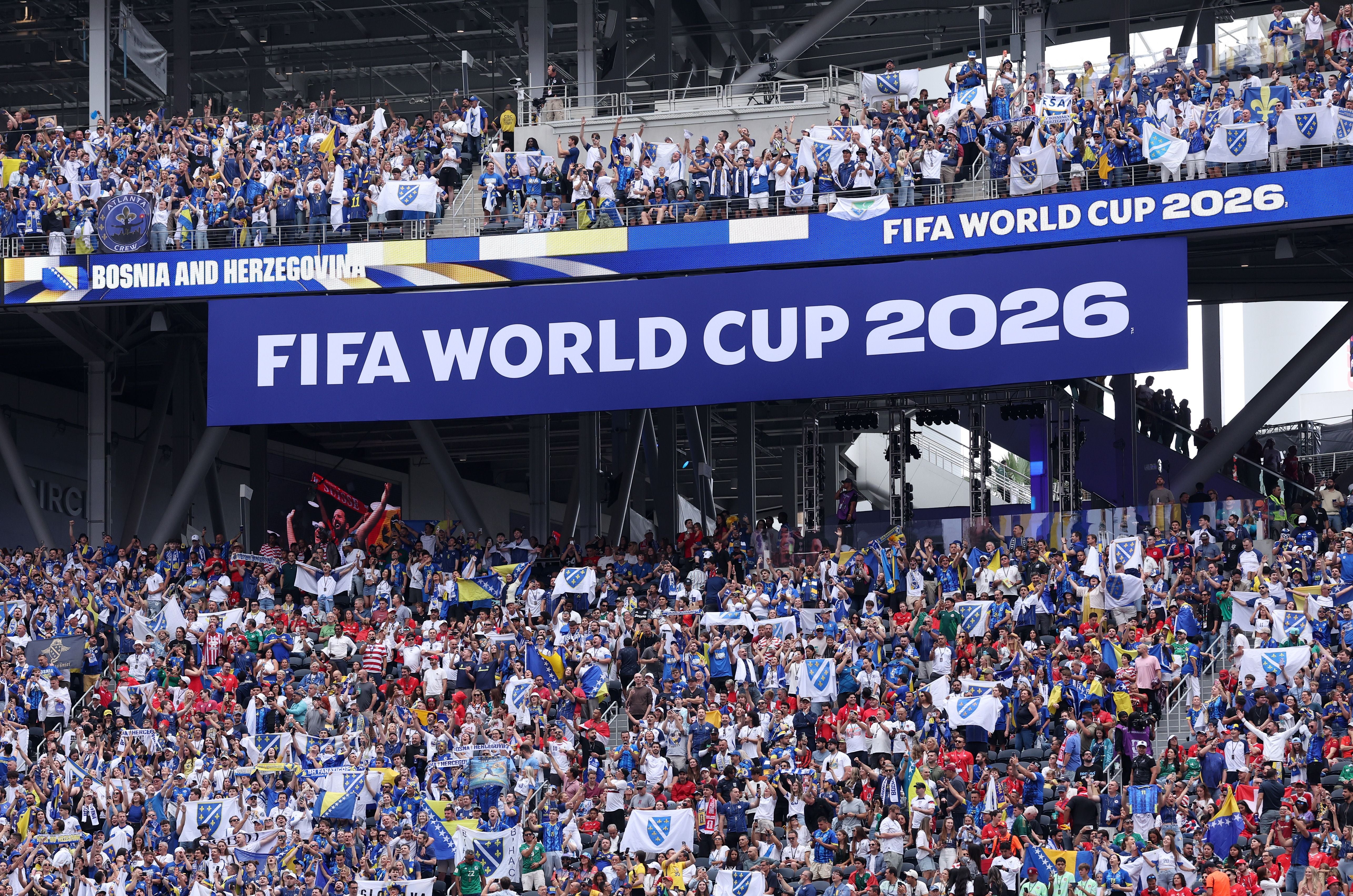 INGLEWOOD, CALIFORNIA - JUNE 18: Bosnia and Herzegovina fans cheer in the stands during the FIFA World Cup 2026 Group B match between Switzerland and Bosnia and Herzegovina at Los Angeles Stadium on June 18, 2026 in Inglewood, California. (Photo by Alex Livesey - FIFA/FIFA via Getty Images)