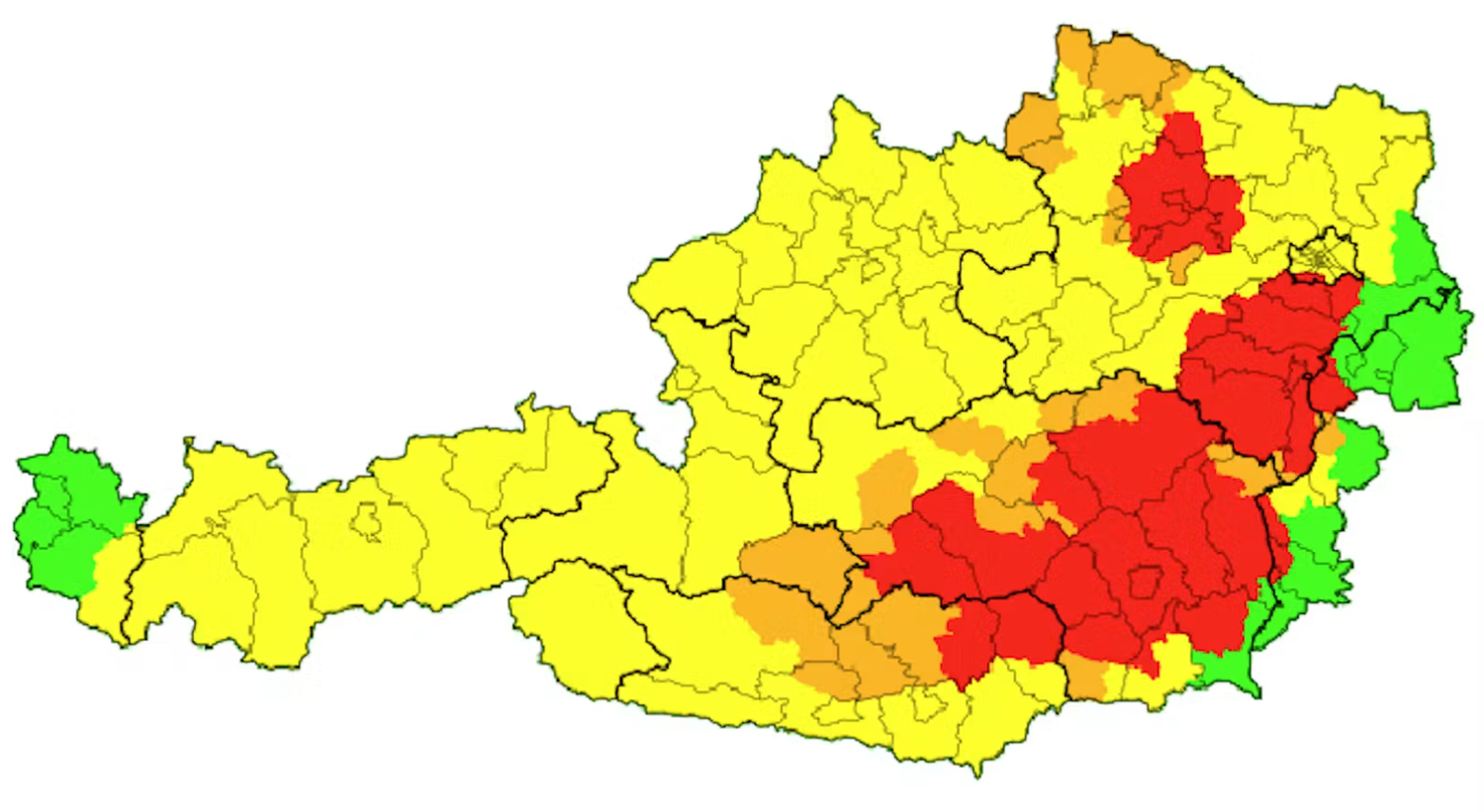 Wetterwarnkarte von Österreich mit Regionen in Grün, Gelb, Orange und Rot markiert.