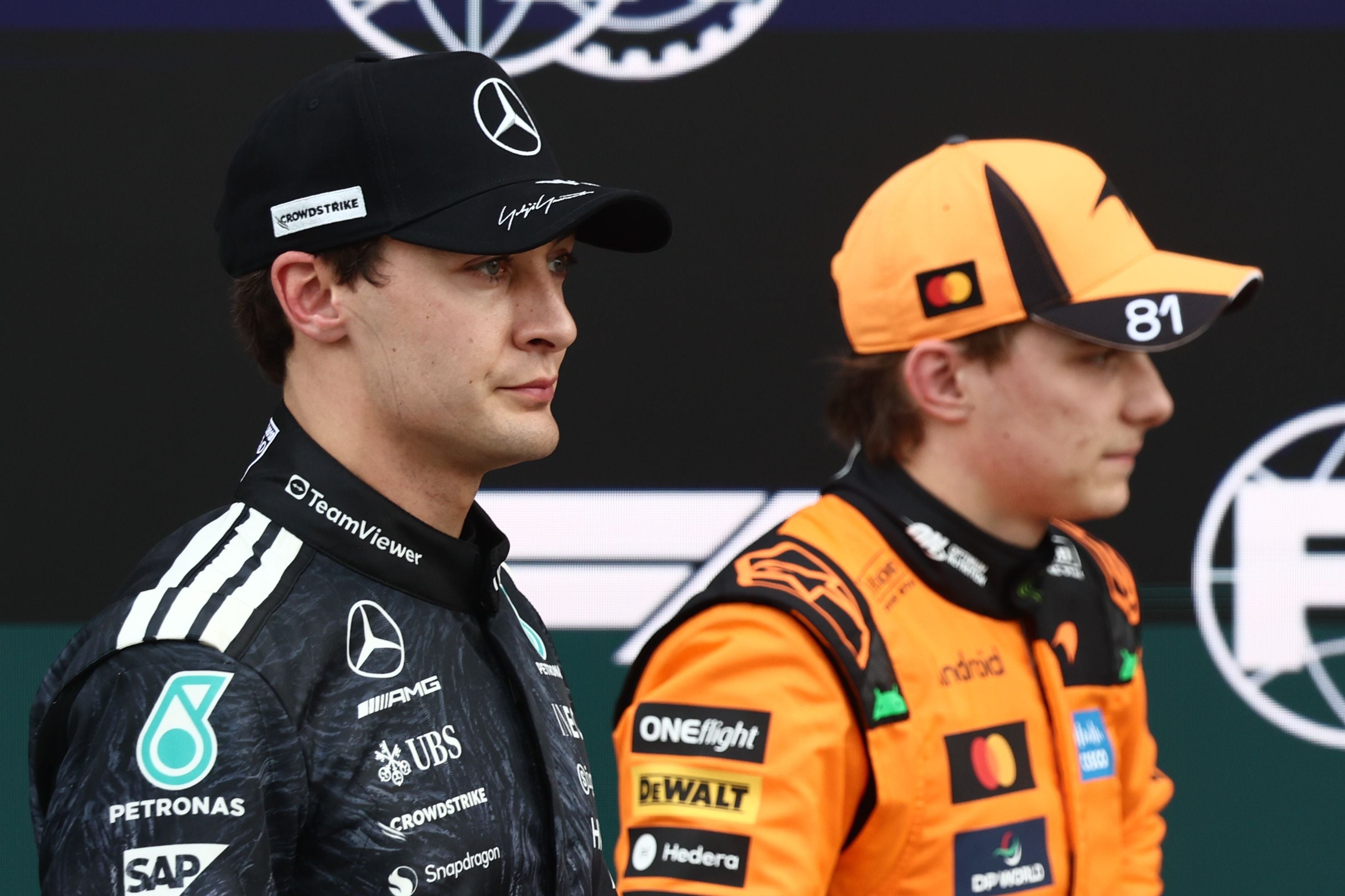 George Russell of Mercedes and Oscar Piastri of McLaren after the qualifying ahead of the Formula 1 Japanese Grand Prix at Suzuka Circuit in Suzuka, Japan on March 28, 2026. (Photo by Jakub Porzycki/NurPhoto via Getty Images)